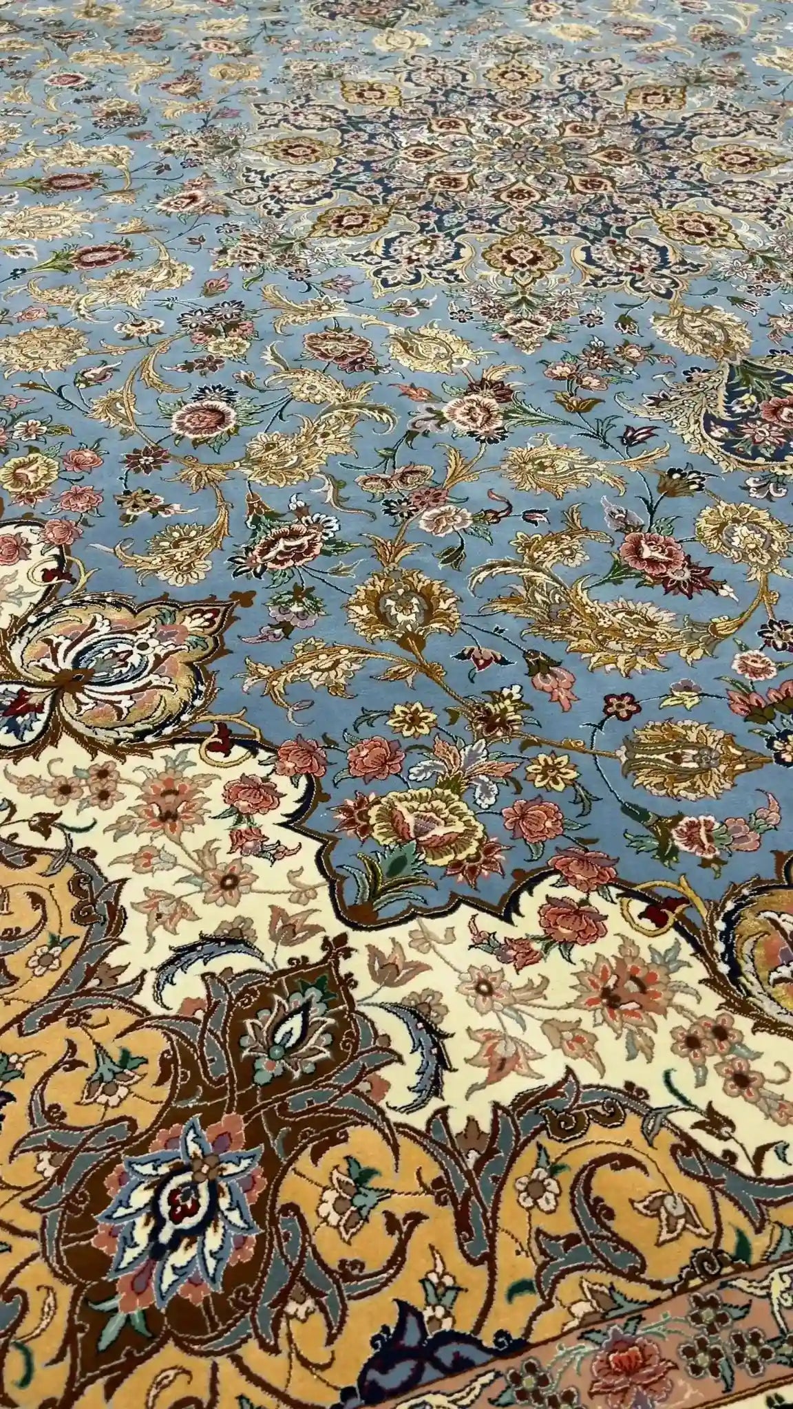"Side angle of the Isfahan Sheikh Bahaie rug, highlighting the high knot density and fine silk details."