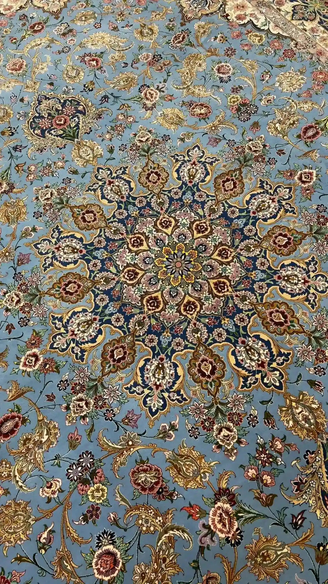 "Top-down view of the hand-knotted Isfahan Persian rug, showcasing traditional Persian craftsmanship and intricate detailing."