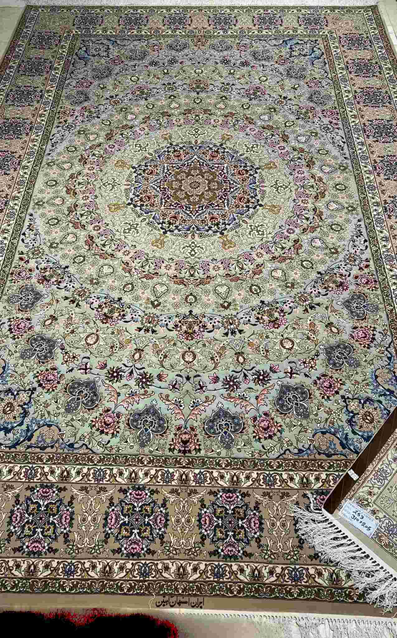 Elegant Abteen Isfahan Persian carpet showcasing a central medallion pattern