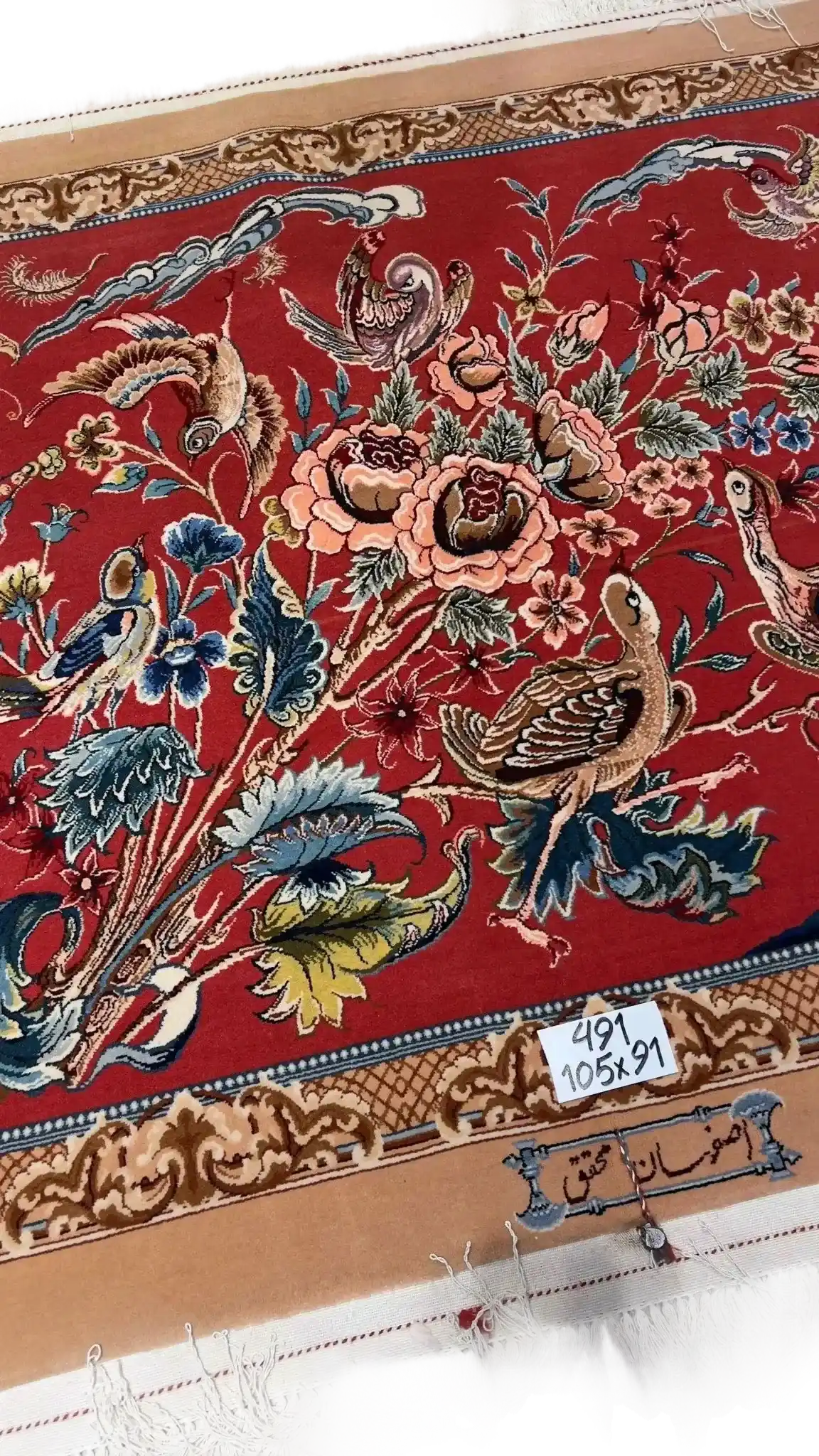 Premium red-hued carpet adorned with bird illustrations and flower patterns, measuring 102 cm by 85 cm