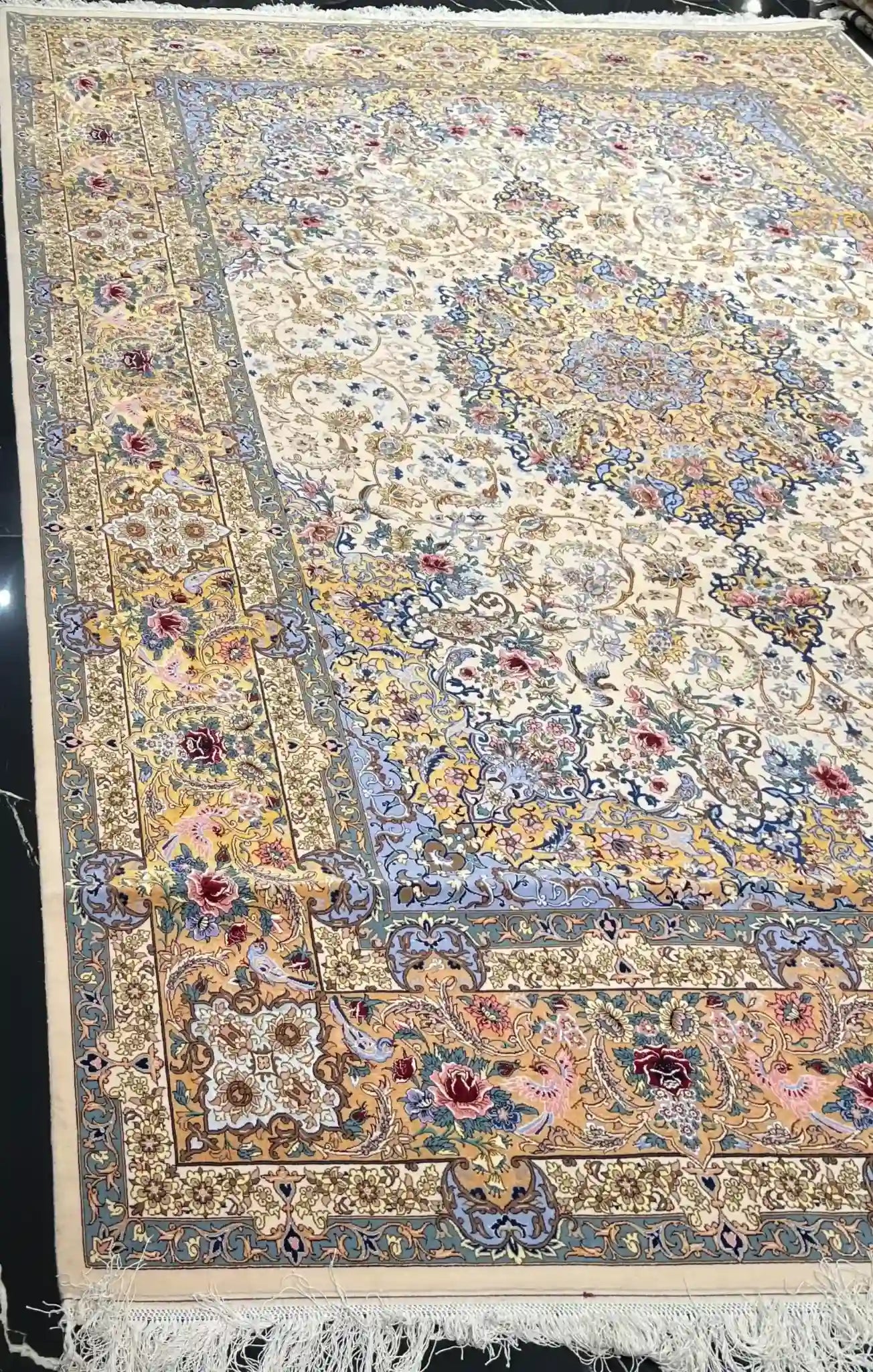 "Hand-knotted Persian rug with silk and wool blend, crafted by Karbasi Zadeh in Isfahan."
