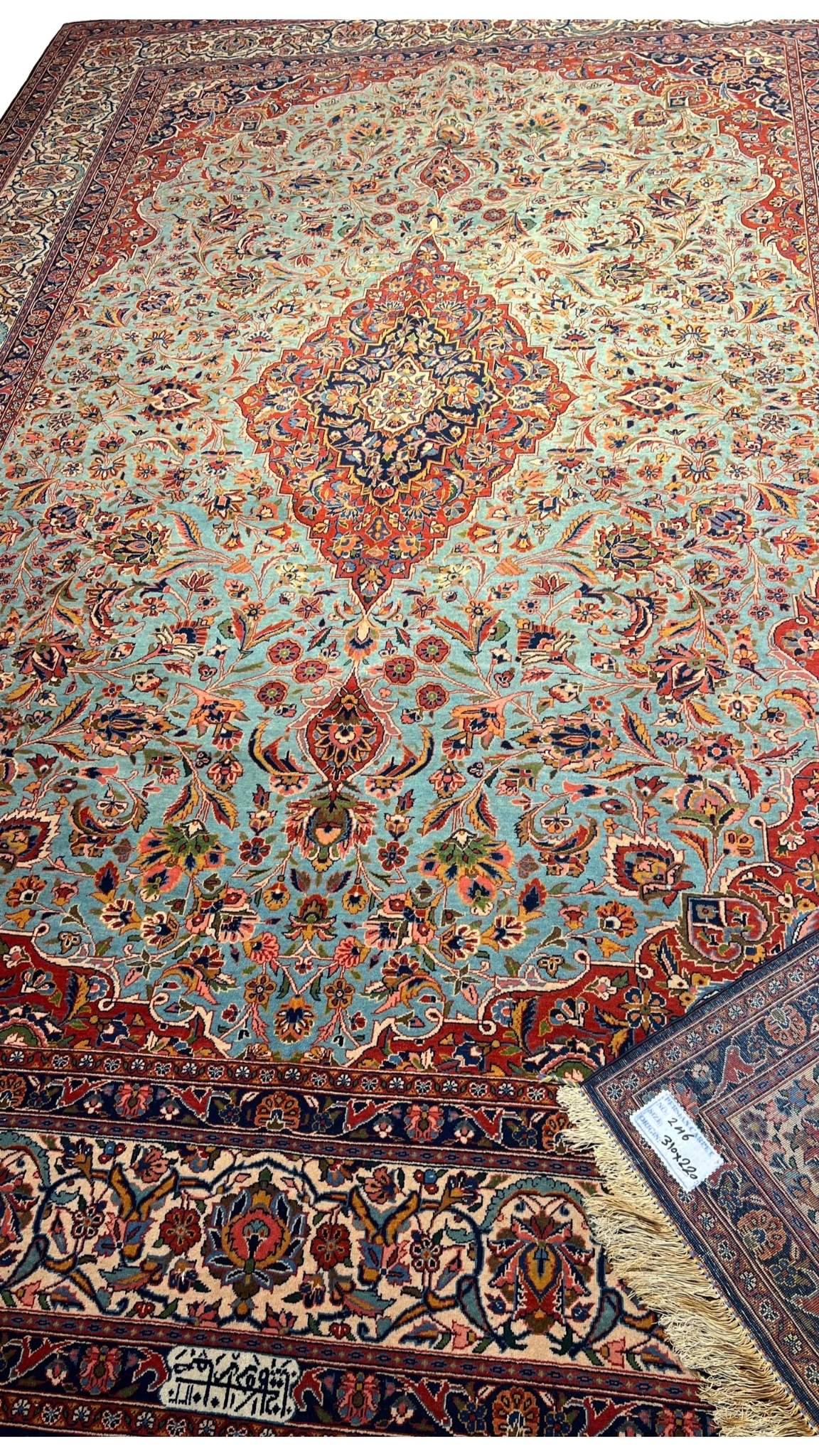 "Antique Persian Kashan rug, hand-knotted by Safarzadeh in silk and wool with intricate floral design"