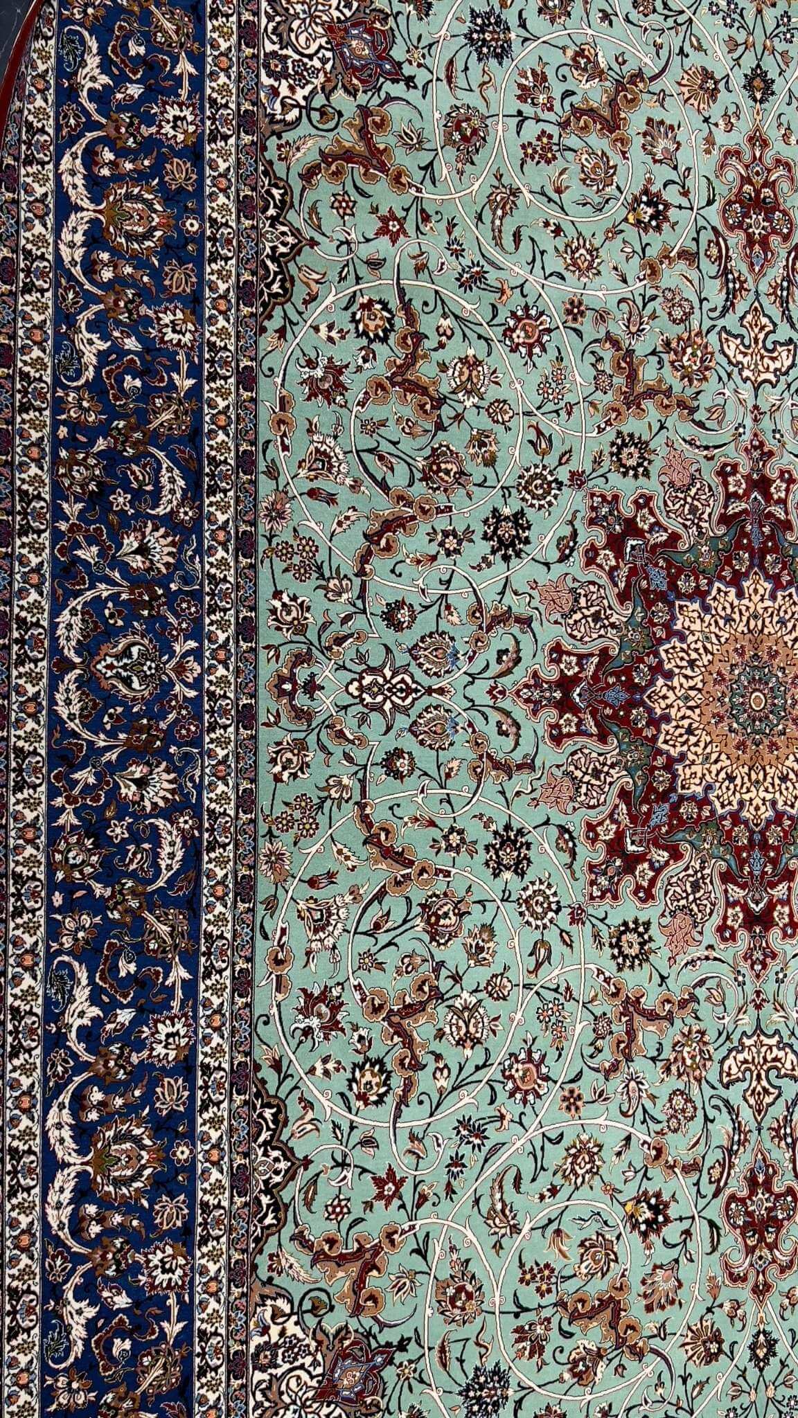 "Isfahan Persian rug by Seirafian family weavers, showcasing pure silk warp"
