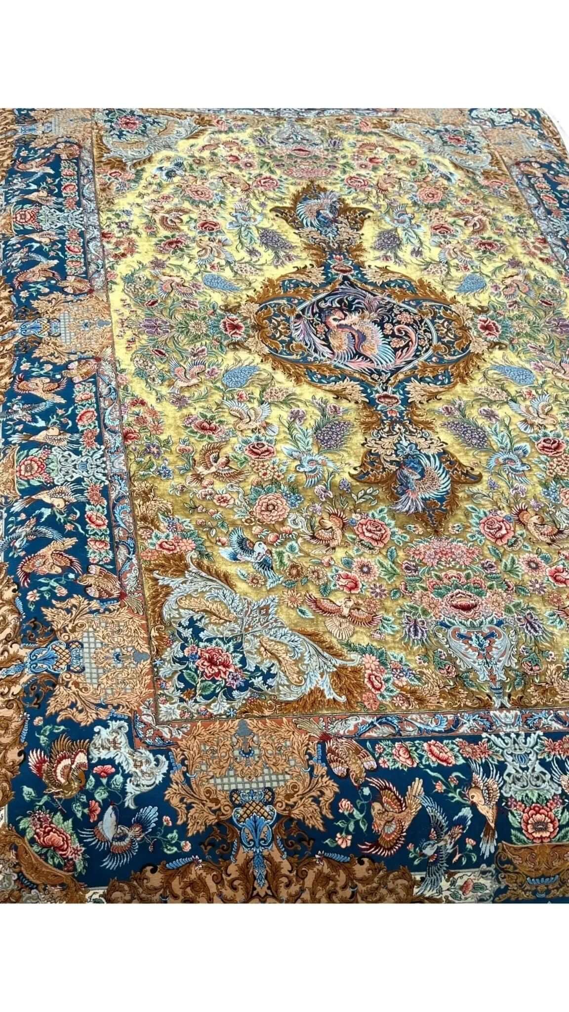 "Luxurious wool and silk rug with vibrant floral patterns."
