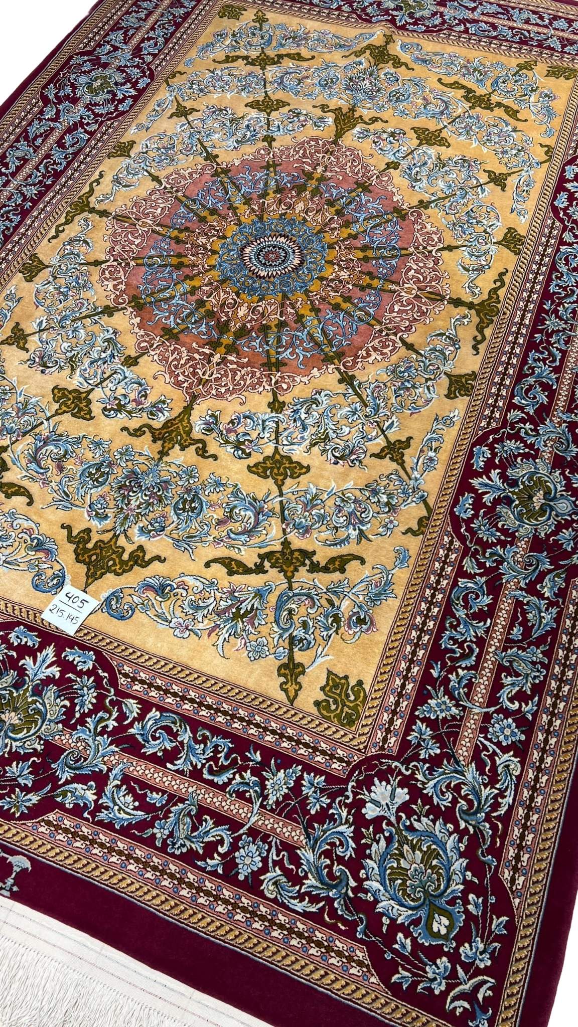 Hand-knotted Persian carpet in red and beige from Isfahan, Iran