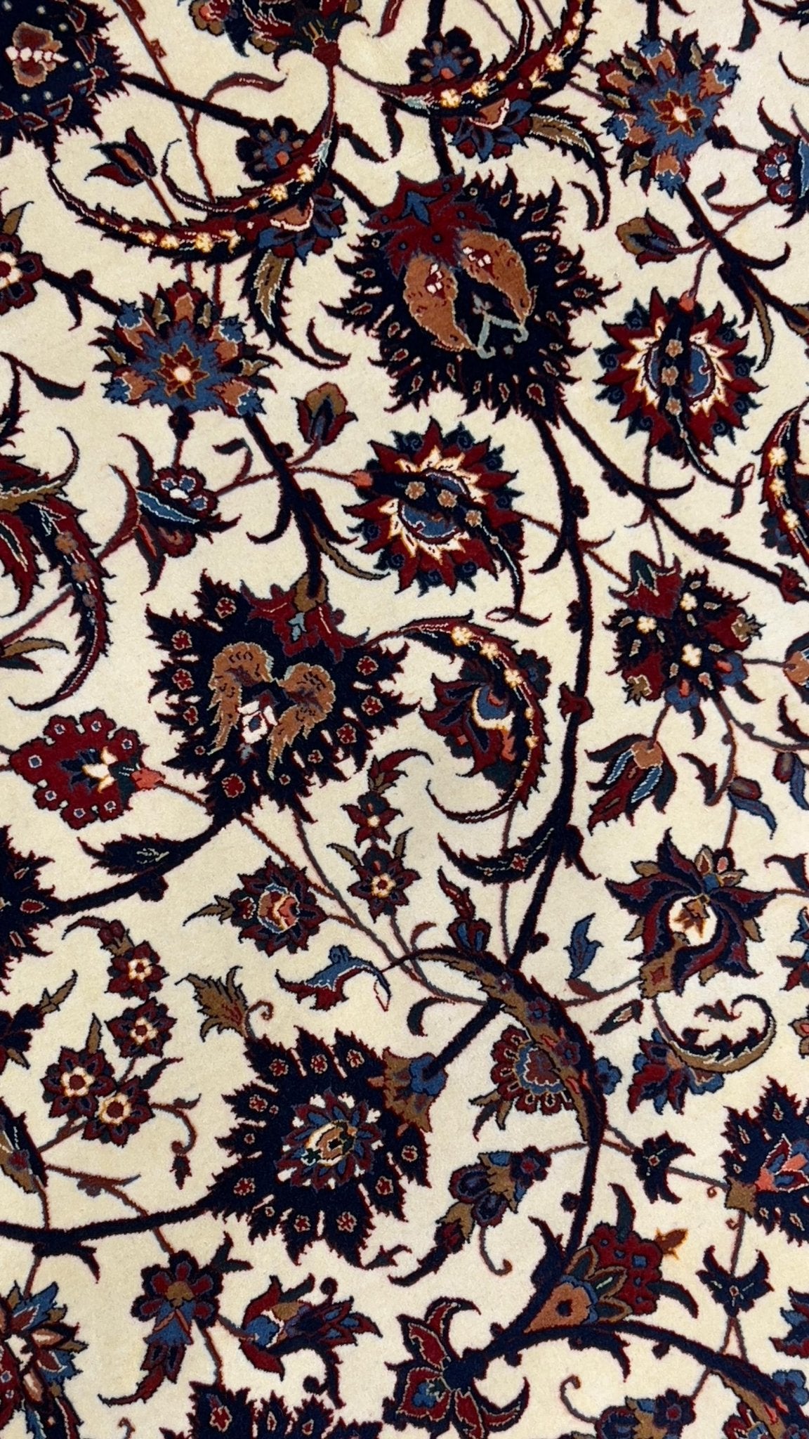 Close-up of intricate details on antique Persian rug from Iran