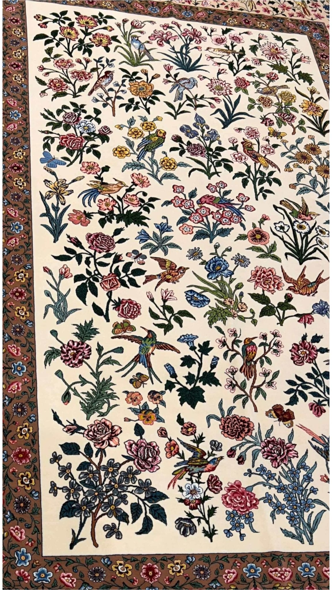  Close-up of wool and silk floral pattern on Seirafian Persian rug