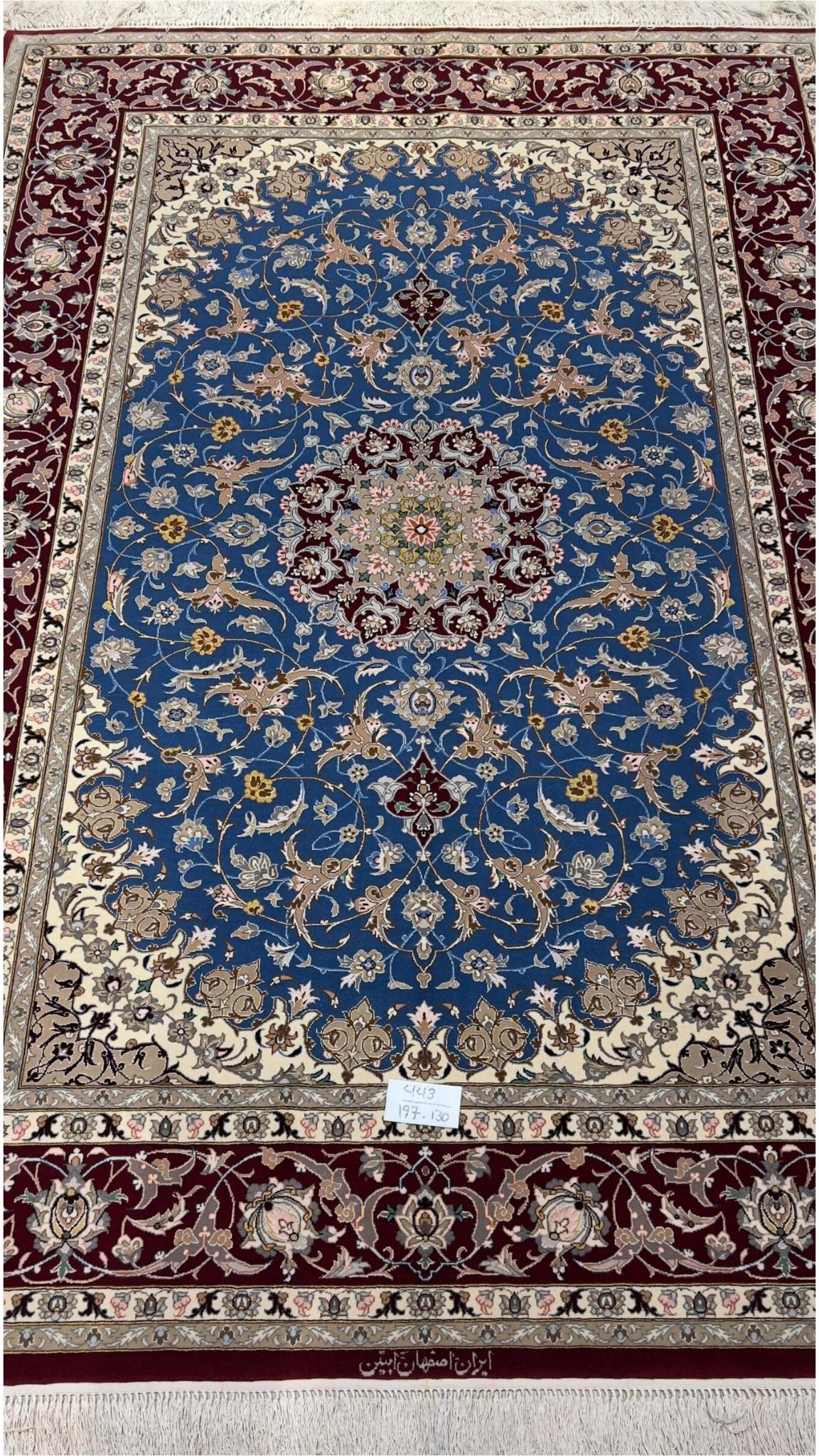 Real red and blue 6x4 Persian rug with floral design, hand-knotted