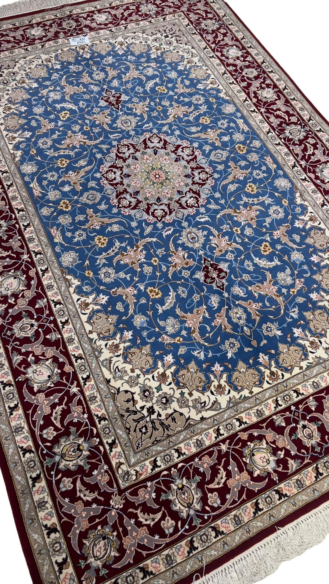 Hand-knotted Persian rug from Isfahan with red and blue classic design