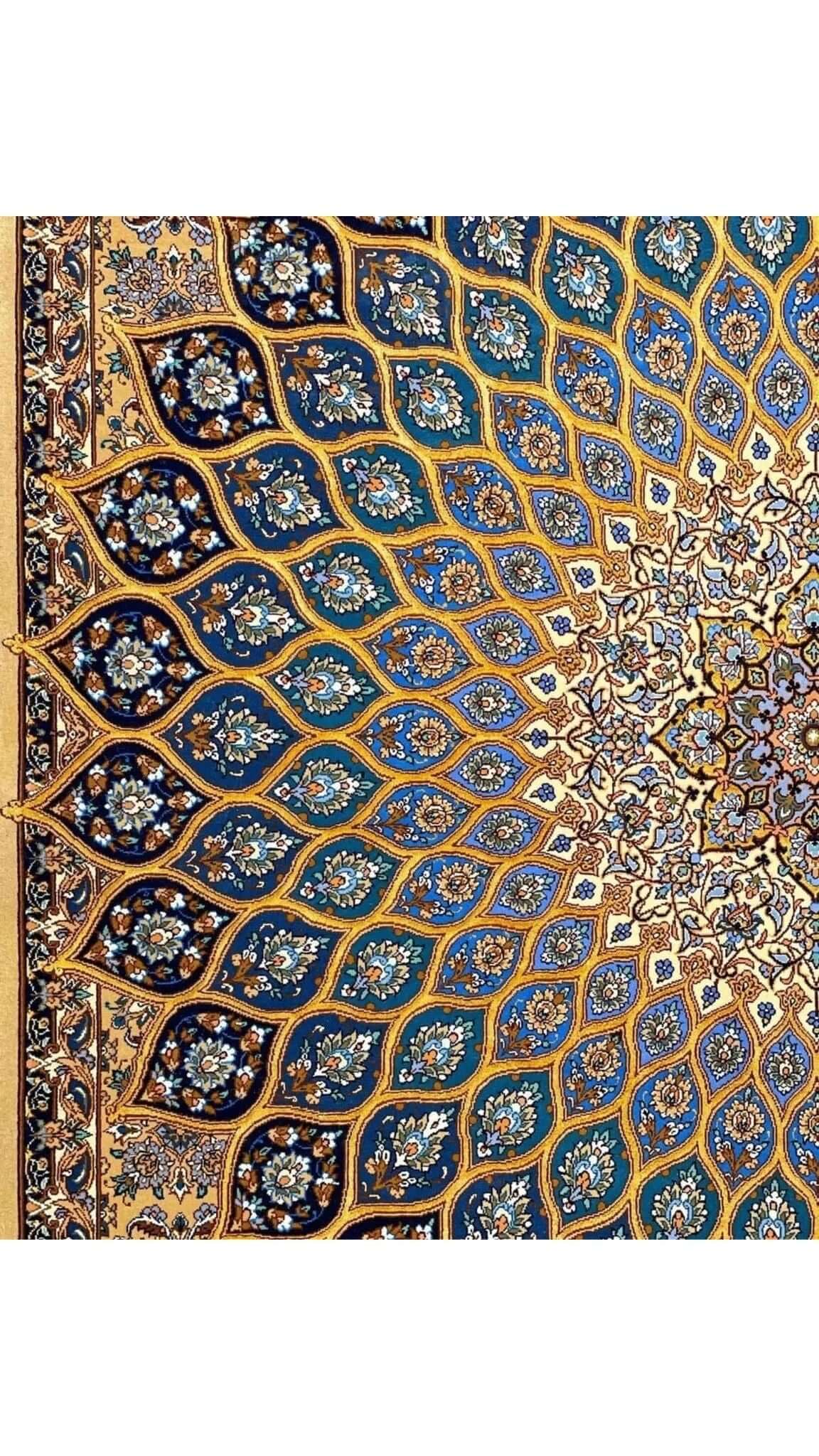 Hand-knotted wool and silk Persian Isfahan rug in blue and beige tones