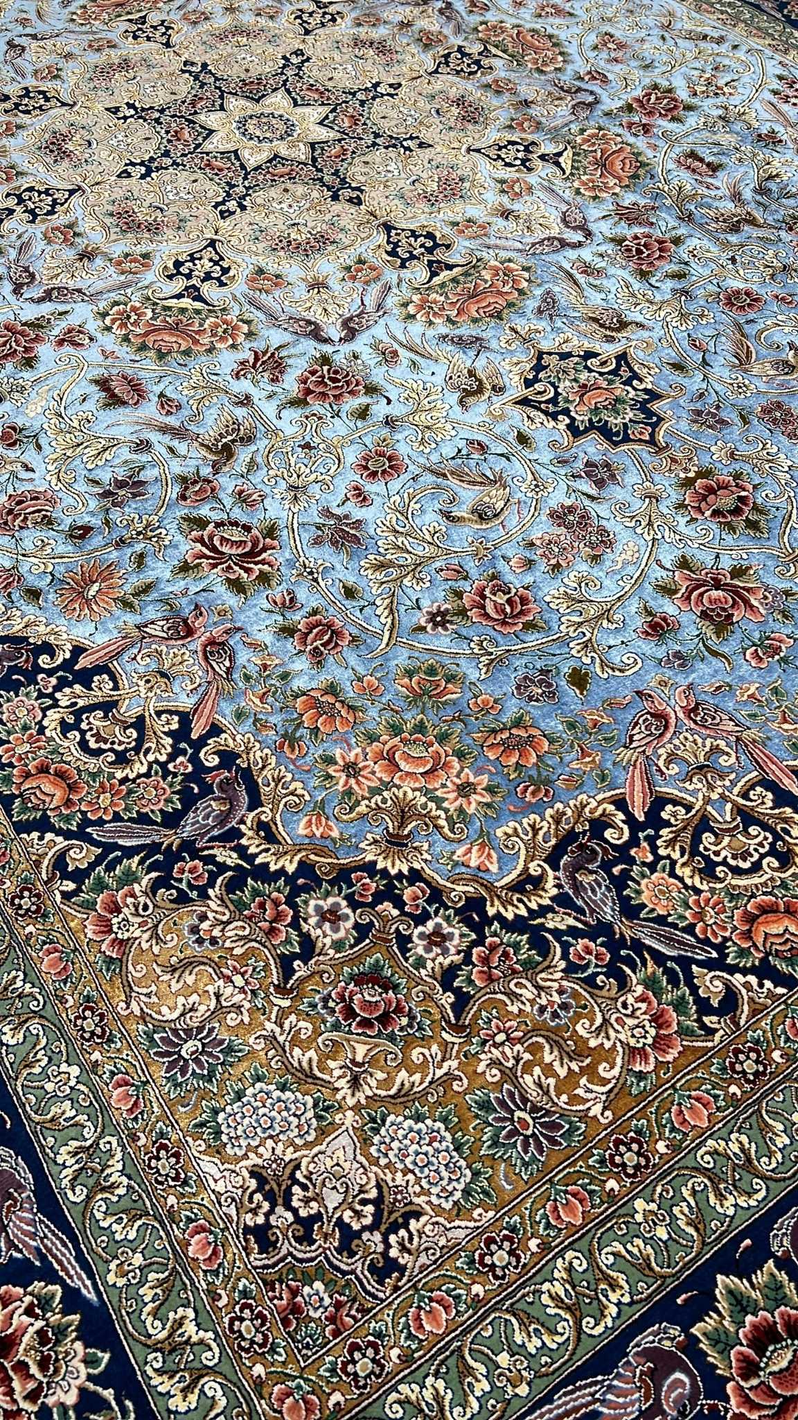 Hand-knotted wool and silk Persian carpet from Isfahan
