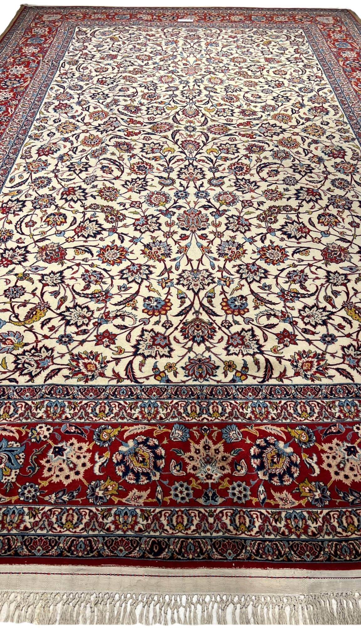 "Antique Isfahan handwoven traditional area rug, 320x219 cm with floral motifs"
