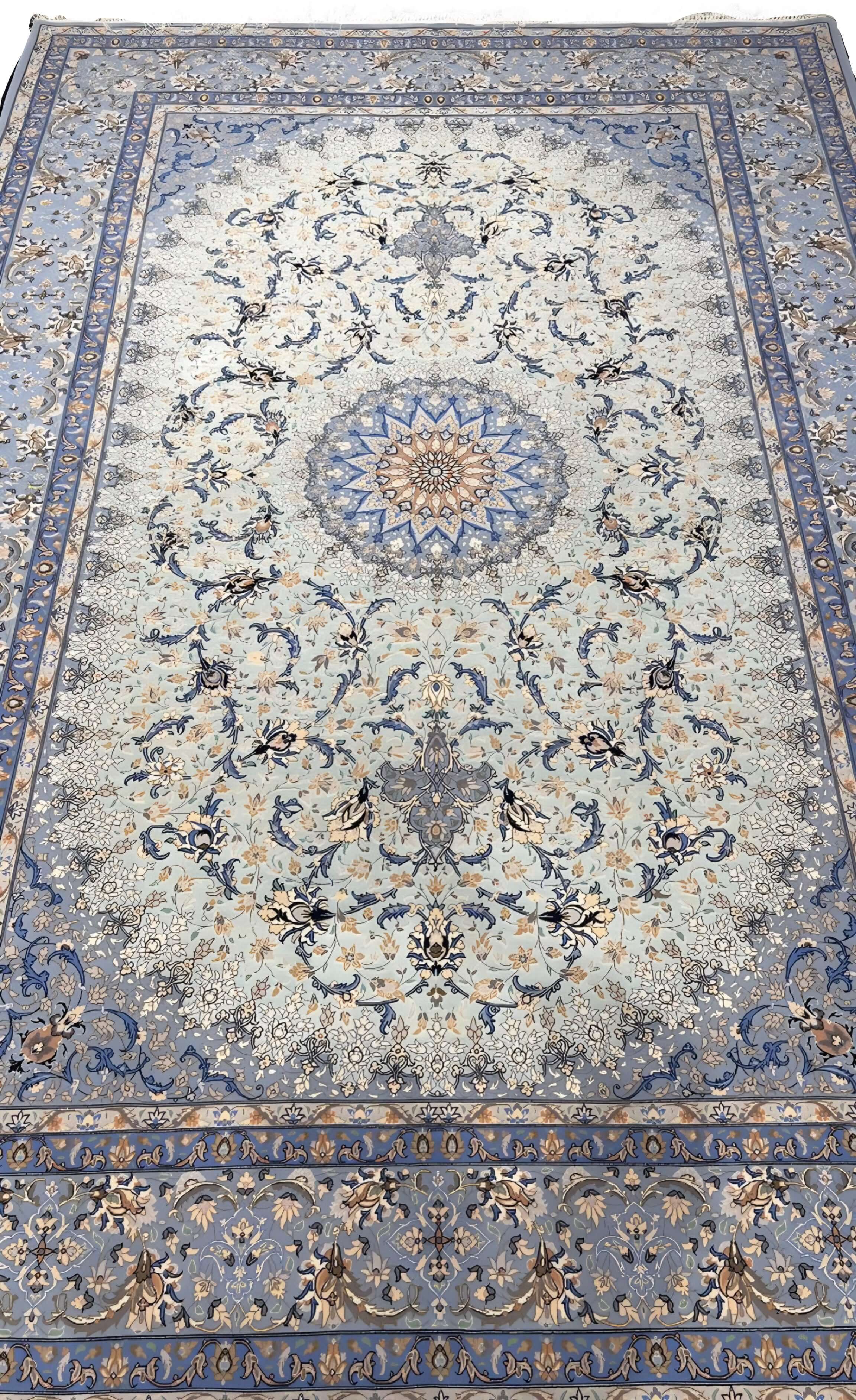 "Hand-knotted light blue Isfahan Persian rug, 303x207 cm, silk and wool blend, by Taghie Zadeh."
