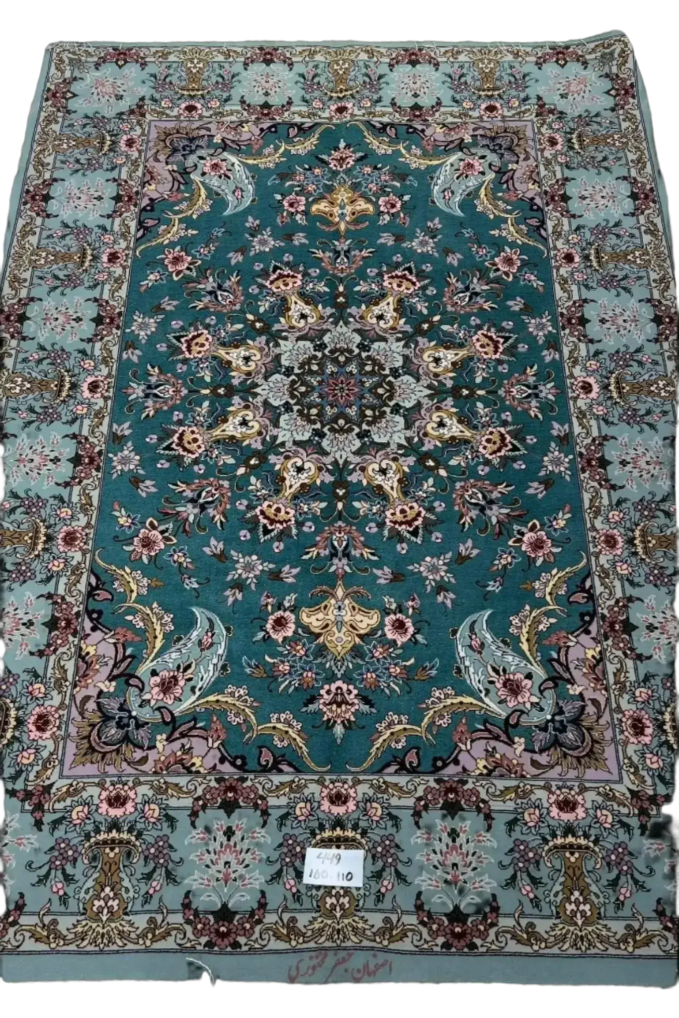 Artisanal Isfahan rug featuring blue and gold floral motifs