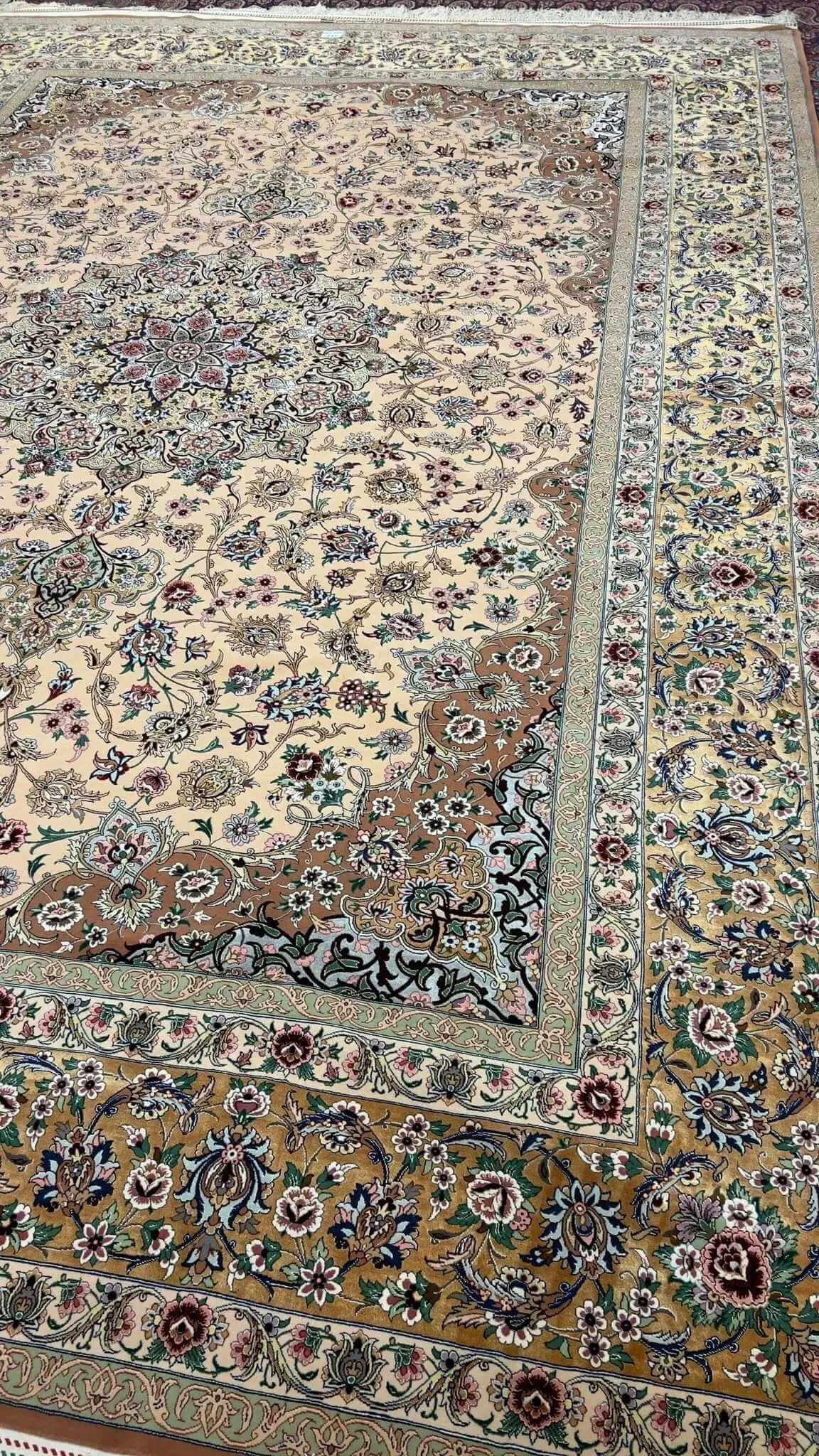 Elegant beige Iranian rug placed on a wooden floor