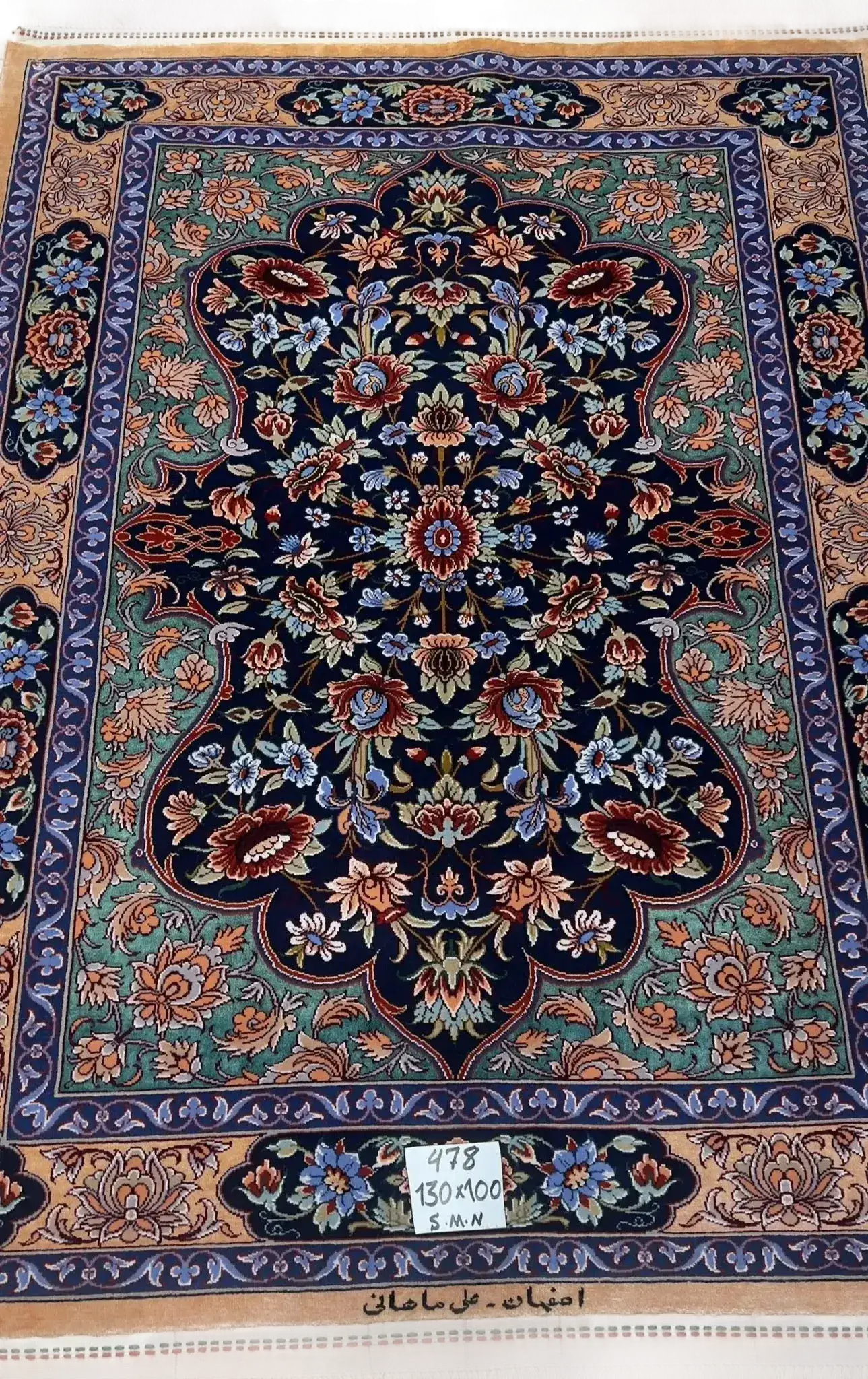 "Hand-knotted Persian rug made of wool and silk, crafted by Ali Samani in Isfahan, featuring intricate floral patterns. Ideal for luxury home decor." 
