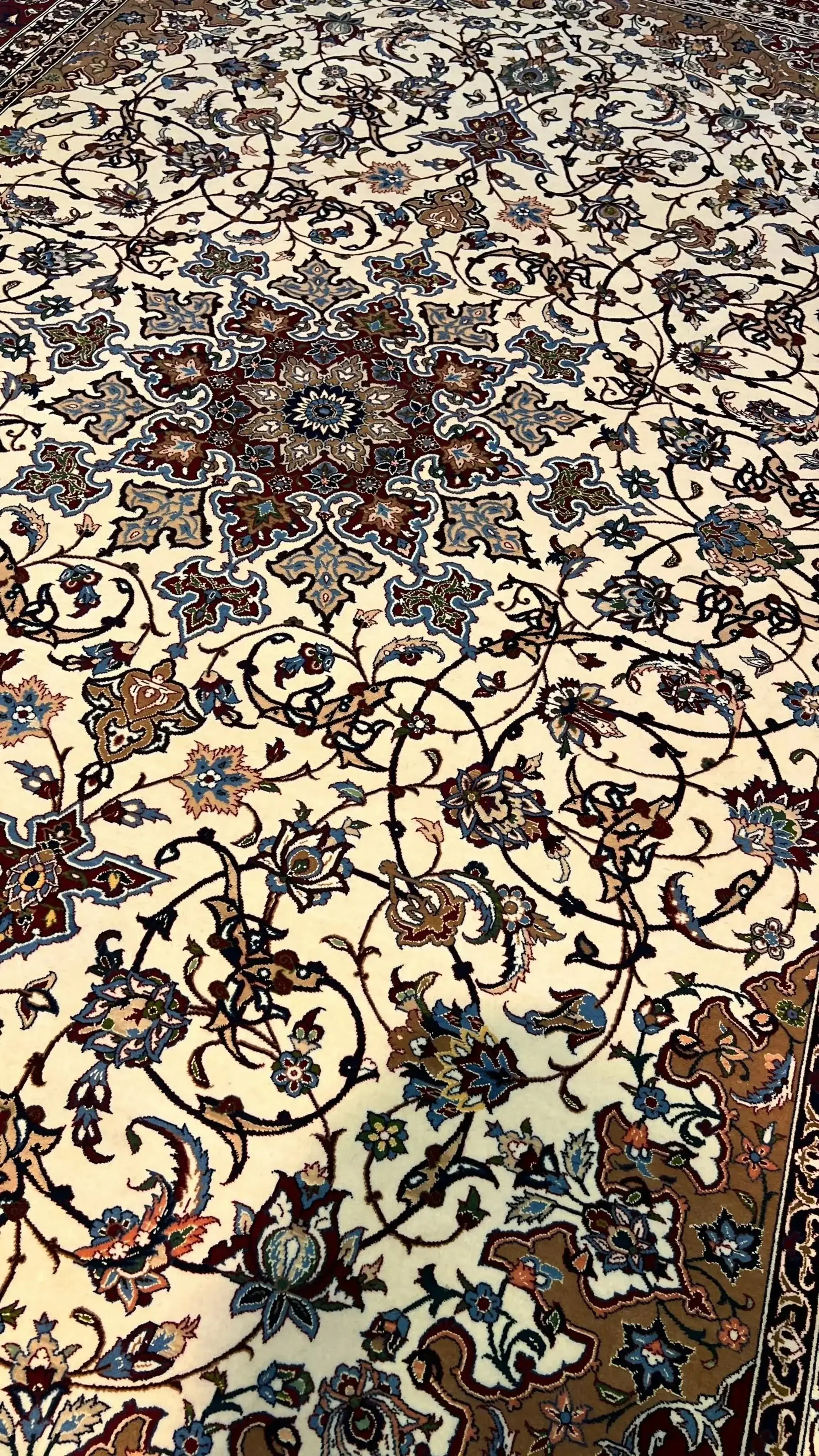 Seirafian Isfahan carpet displaying the classic Lachak va Toranj pattern on the floor