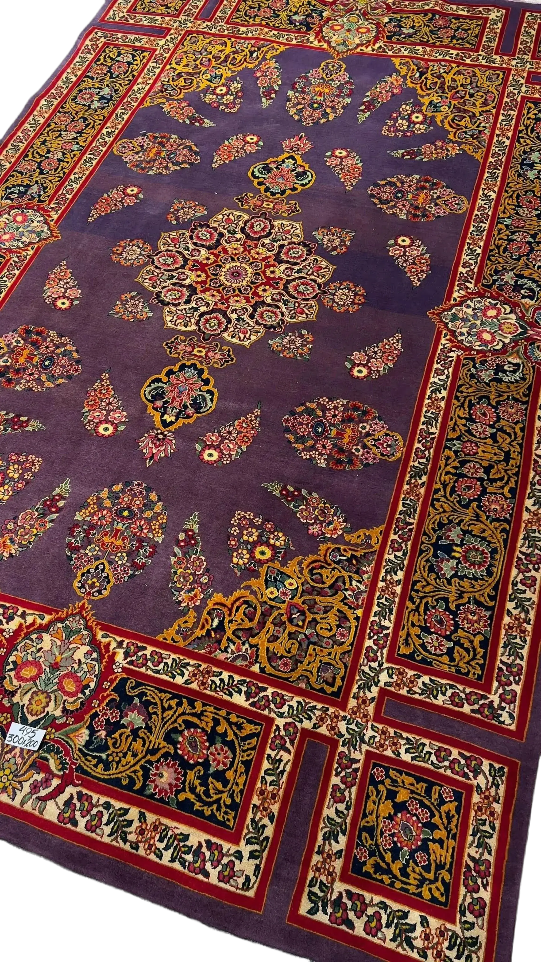 Detailed image of the Elegant Mashad Rug highlighting its ornate purple patterns