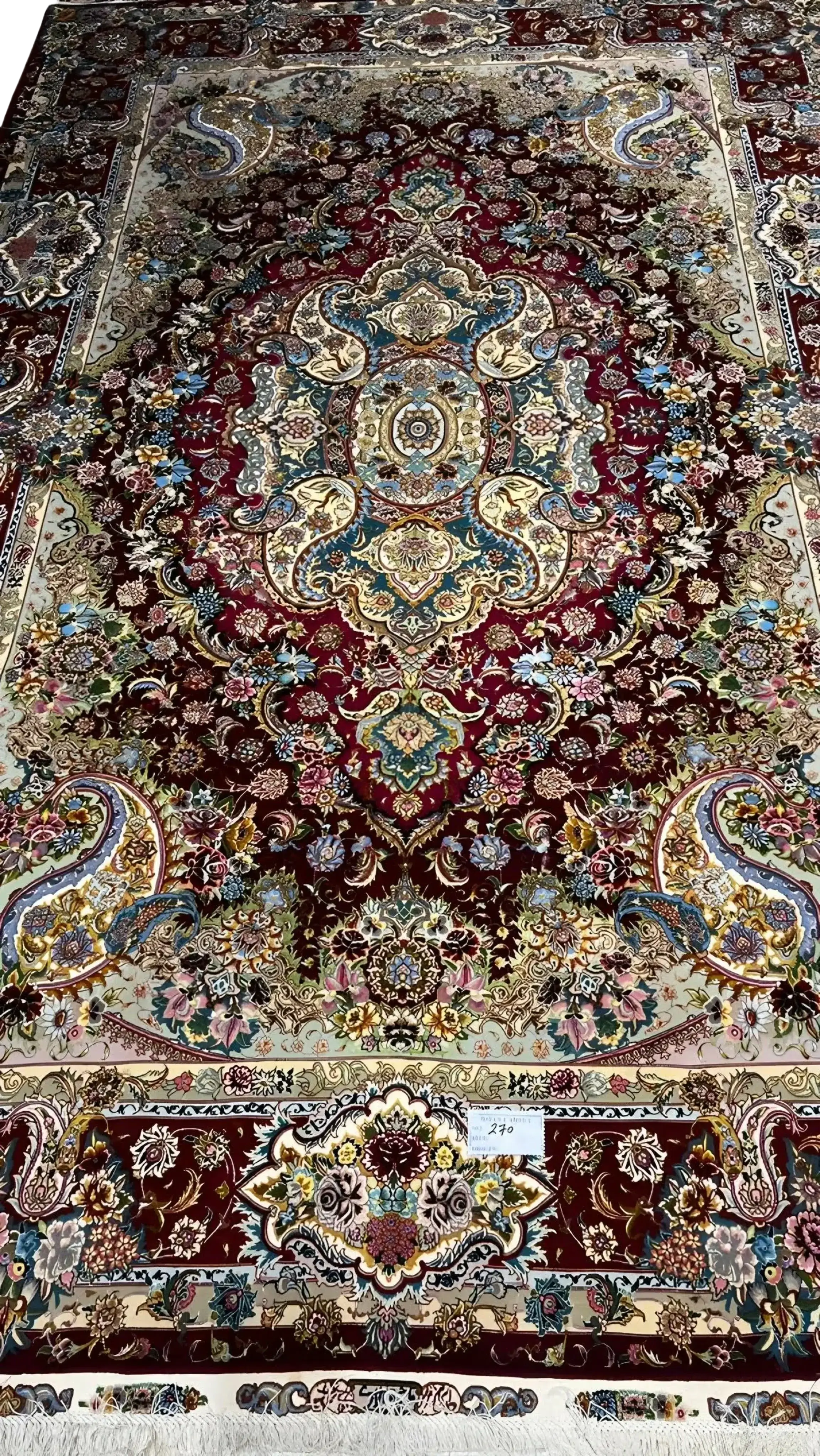 Elegant Tabriz rug showcasing traditional handwoven artistry for interior design