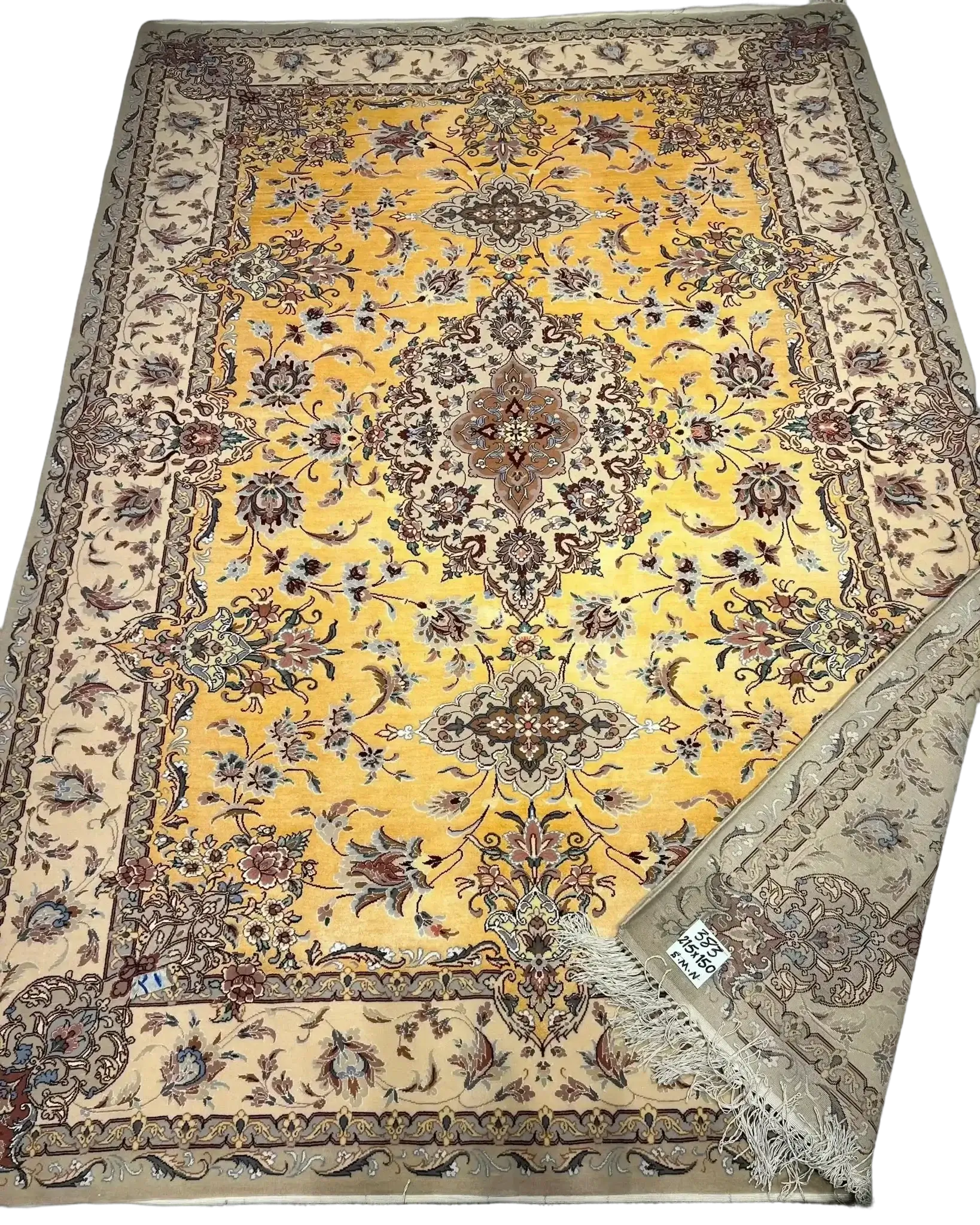 Luxurious beige and yellow silk rug with decorative motifs