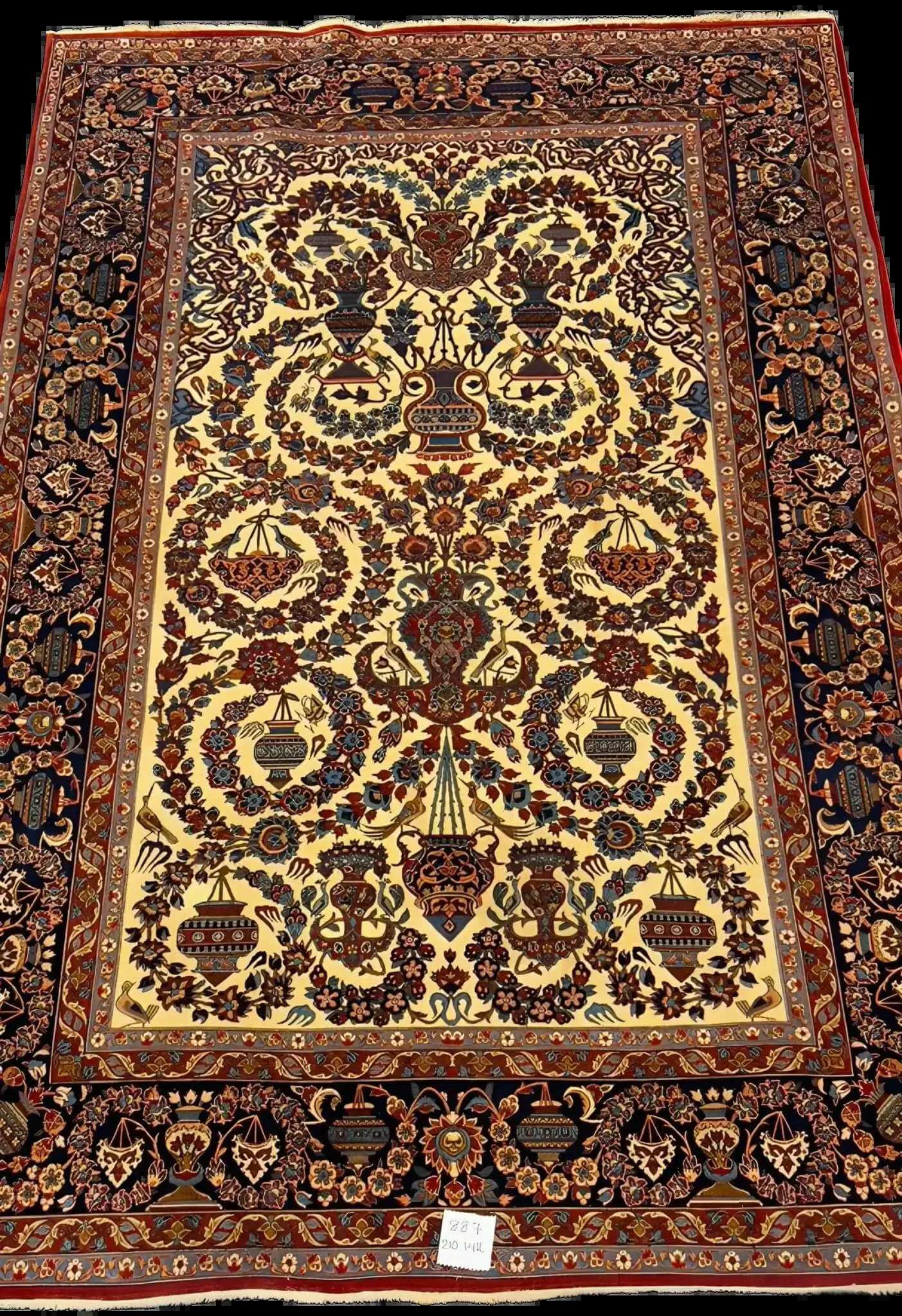 Vintage oriental rug from a 75-year-old collection featuring elaborate floral motifs