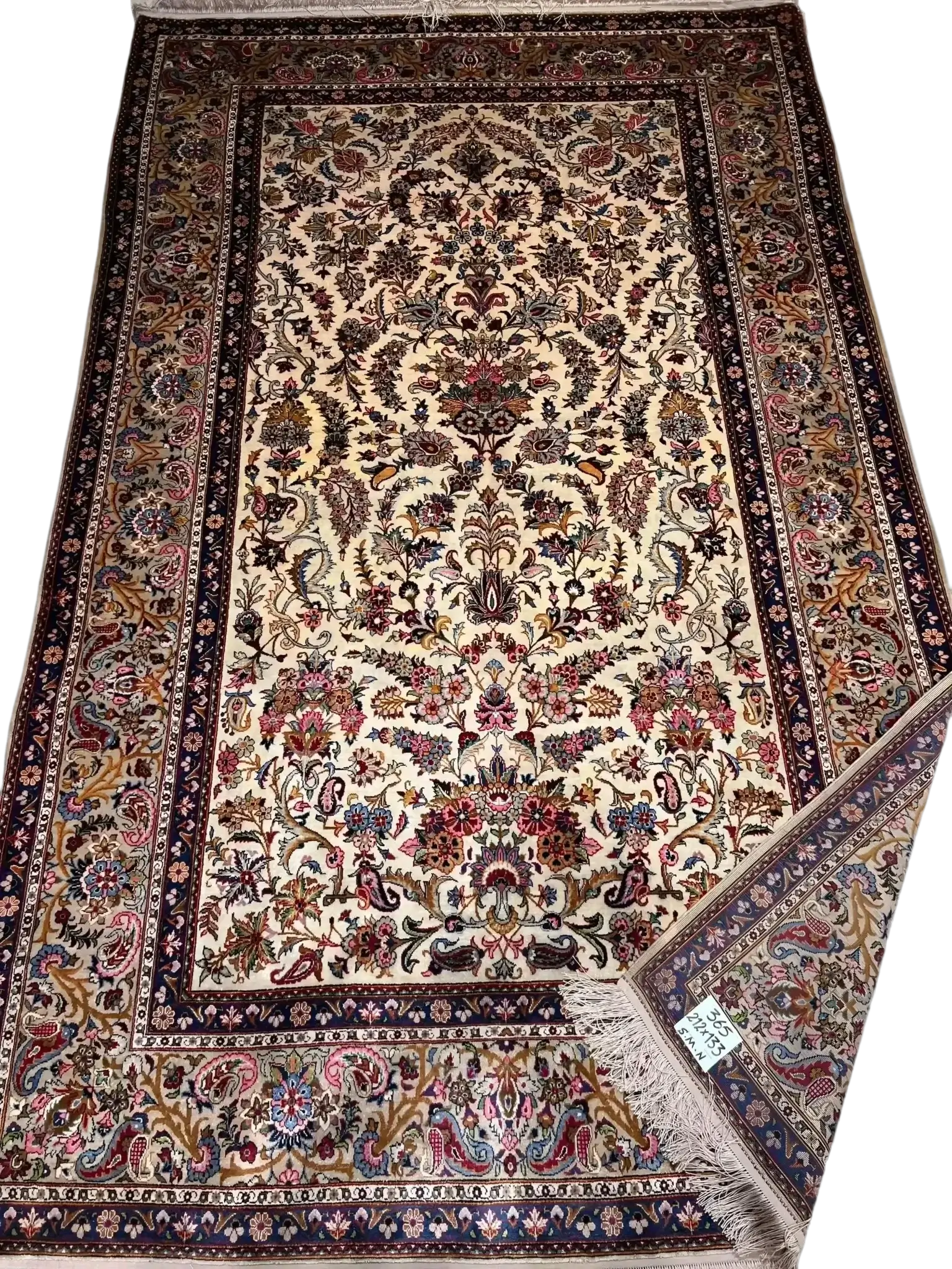 Full silk Kashan rug with intricate floral patterns and rich colors