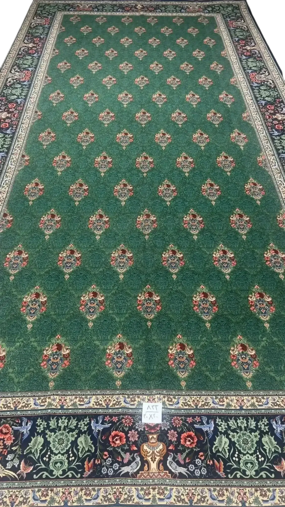 Full view of the unique 400 cm x 200 cm high knot density rug with elaborate floral motifs