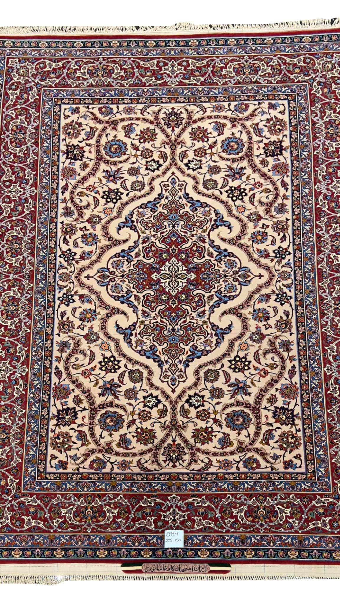 Classic antique rug featuring a sophisticated design in red, blue, and white, untouched for half a century