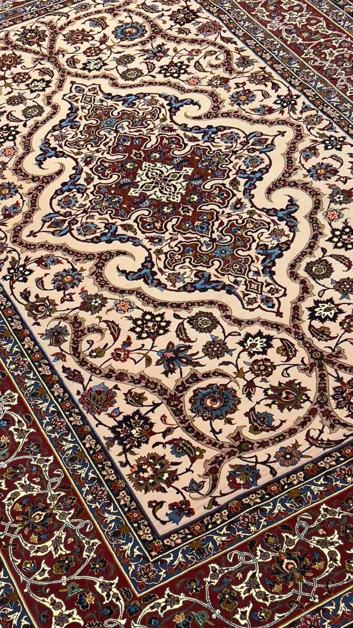 Vintage antique rug with intricate blue and red patterns, preserved for over 50 years