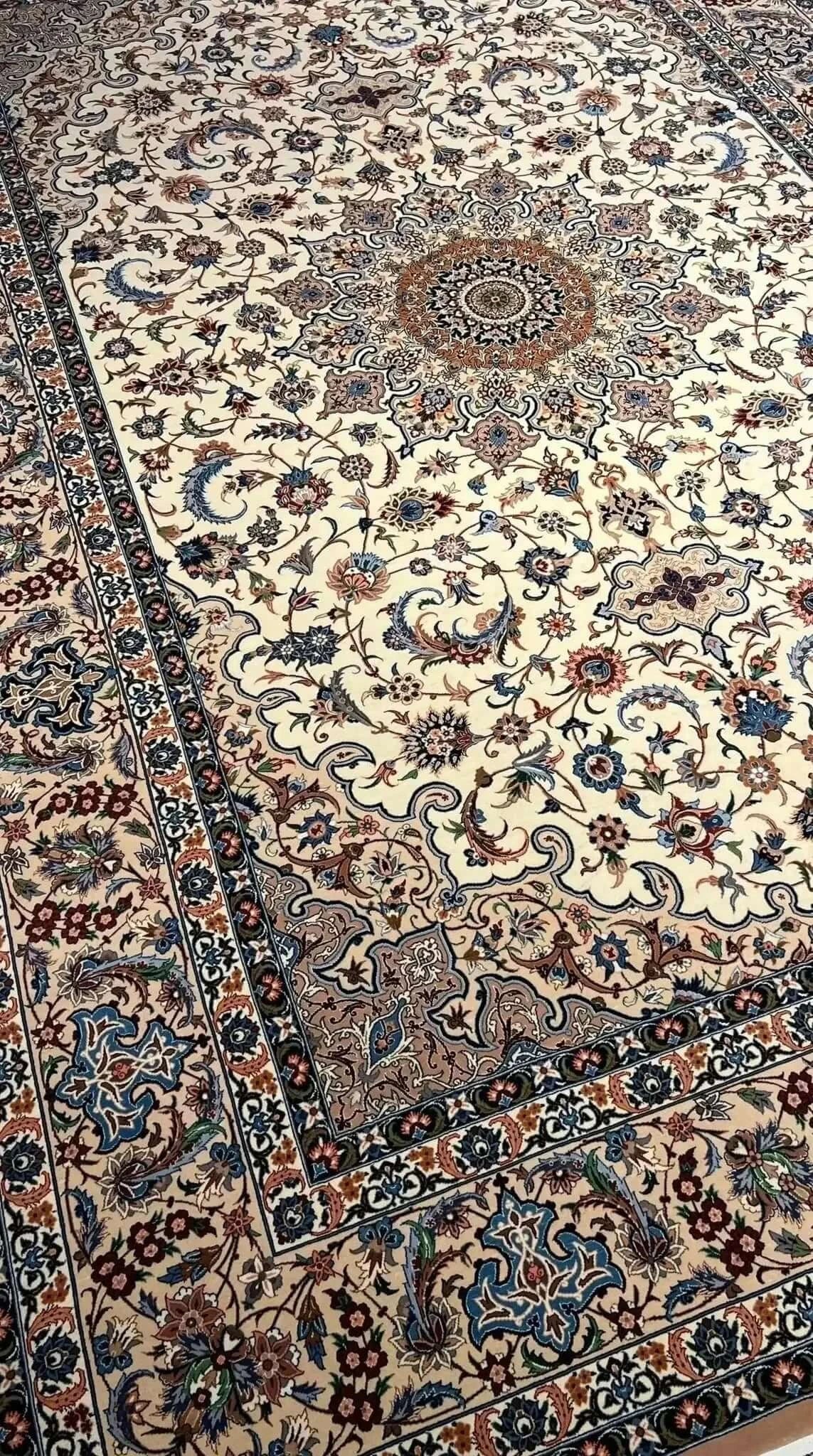 "Exquisite Isfahan Persian rug, crafted by master weaver Ahmad Zojaji. This 300 cm x 200 cm (9.8 x 6.5 feet) rug features a hand-knotted wool and silk pile with a silk warp. The intricate design has a knot density of 810,000 knots per square meter, making this new rug from Isfahan an elegant, one-of-a-kind piece. Limited stock available."