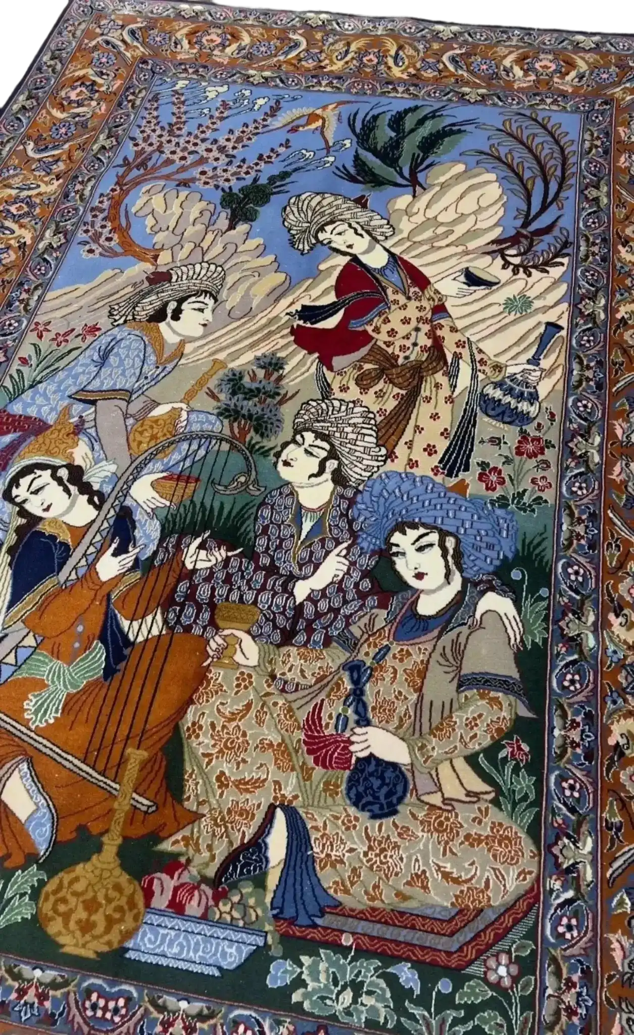 "Exquisite handmade Isfahan Persian rug, crafted from wool and silk, featuring intricate designs in timeless hues. Perfect for elevating home decor with luxury and elegance. Shop authentic Persian rugs online to enhance any space with this stunning 170 cm x 110 cm area rug."