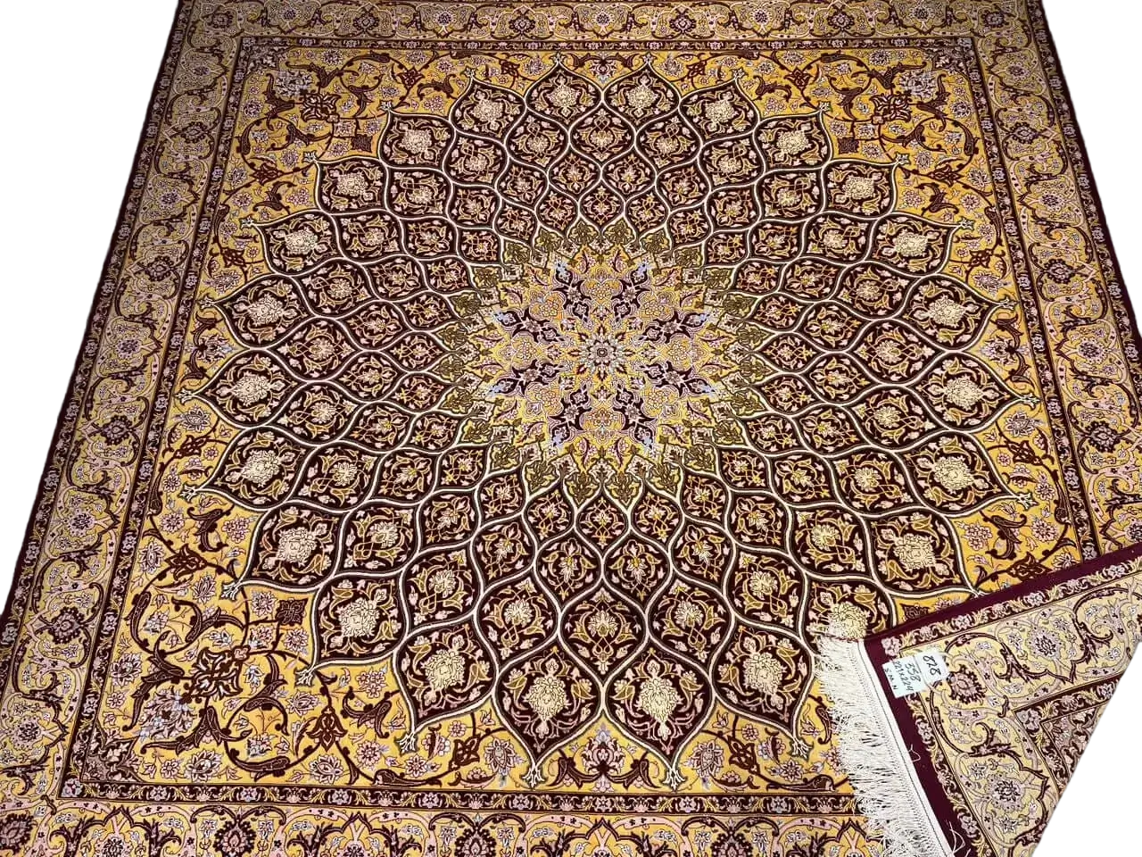 Karbasi Zadeh's Golden Dome Rug with intricate gold and brown patterns