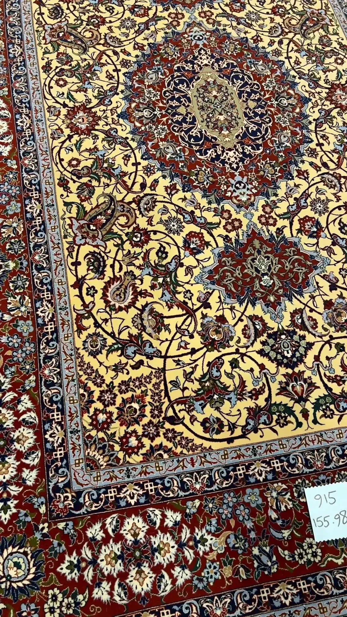 Close-up of the intricate weave and detailed patterns on Master Khajeh's high knot density rug