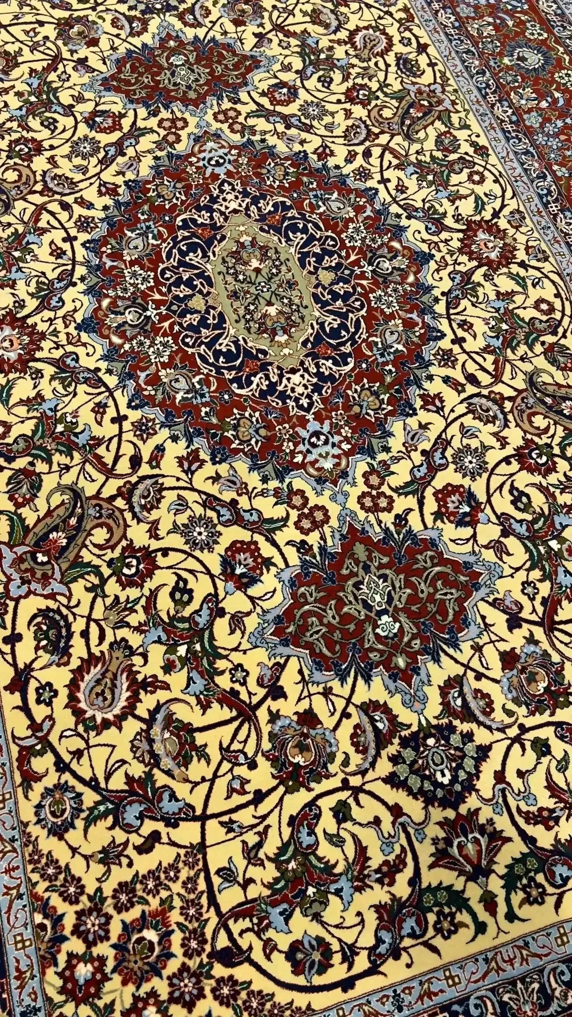 Master Khajeh's high knot density rug featuring a prominent medallion pattern