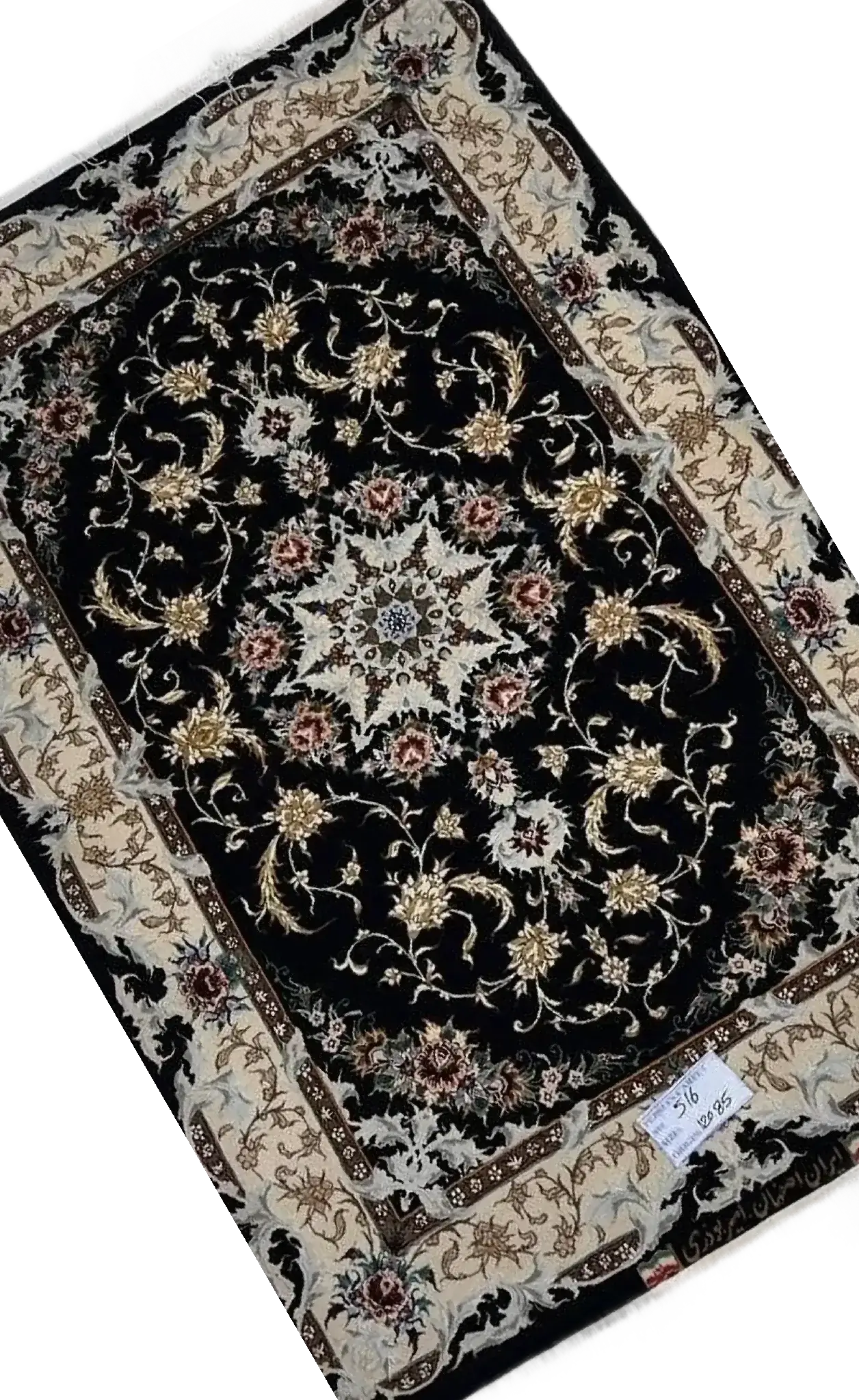 "Close-up of traditional Persian carpet from Isfahan, with fine silk and wool pile"
