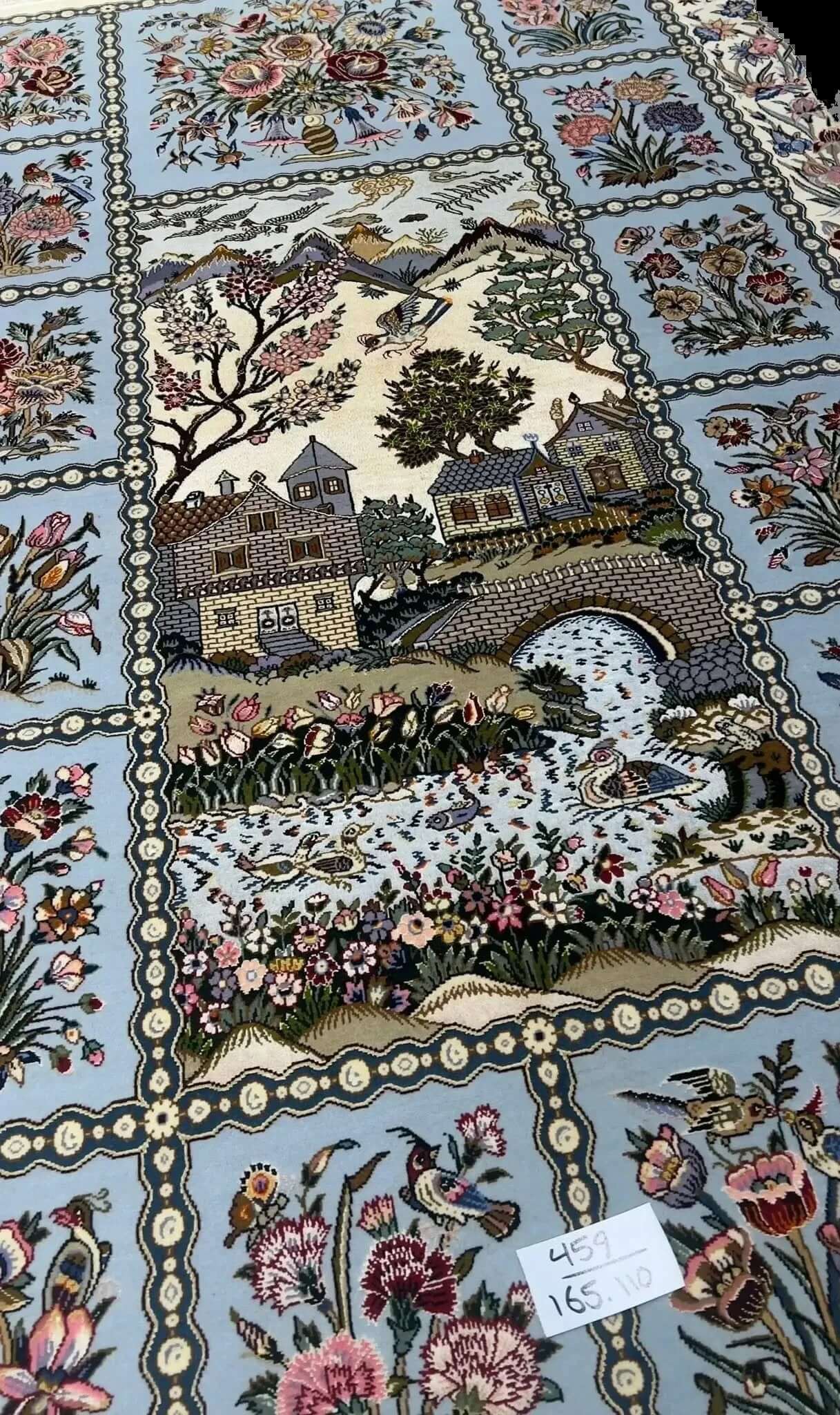 "Oriental Persian rug by Rasooli, luxurious silk and wool blend, hand-knotted in Isfahan, 5.4 feet x 3.6 feet size, perfect for elevating any home decor."
