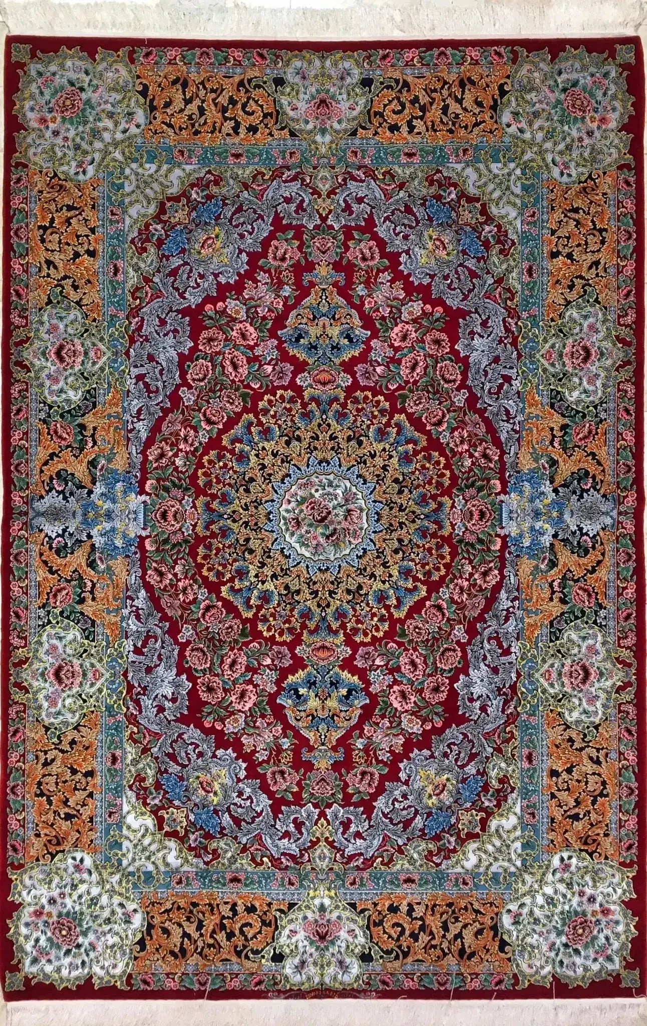 Hand-knotted Isfahan Persian carpet with intricate floral design in wool and silk
