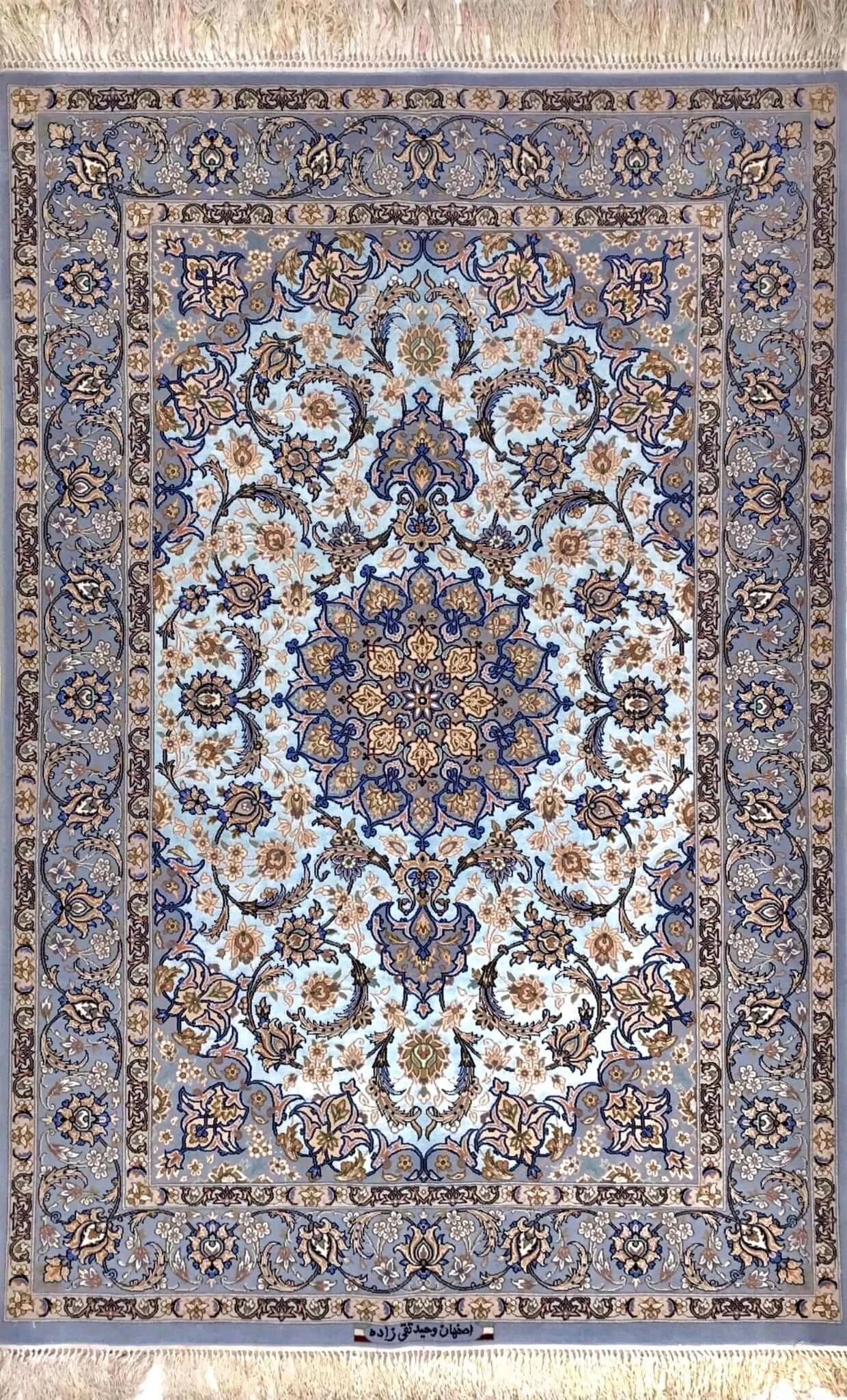 Hand-knotted Persian rug from Isfahan, featuring intricate floral patterns, wool and silk blend, 172 cm x 110 cm

