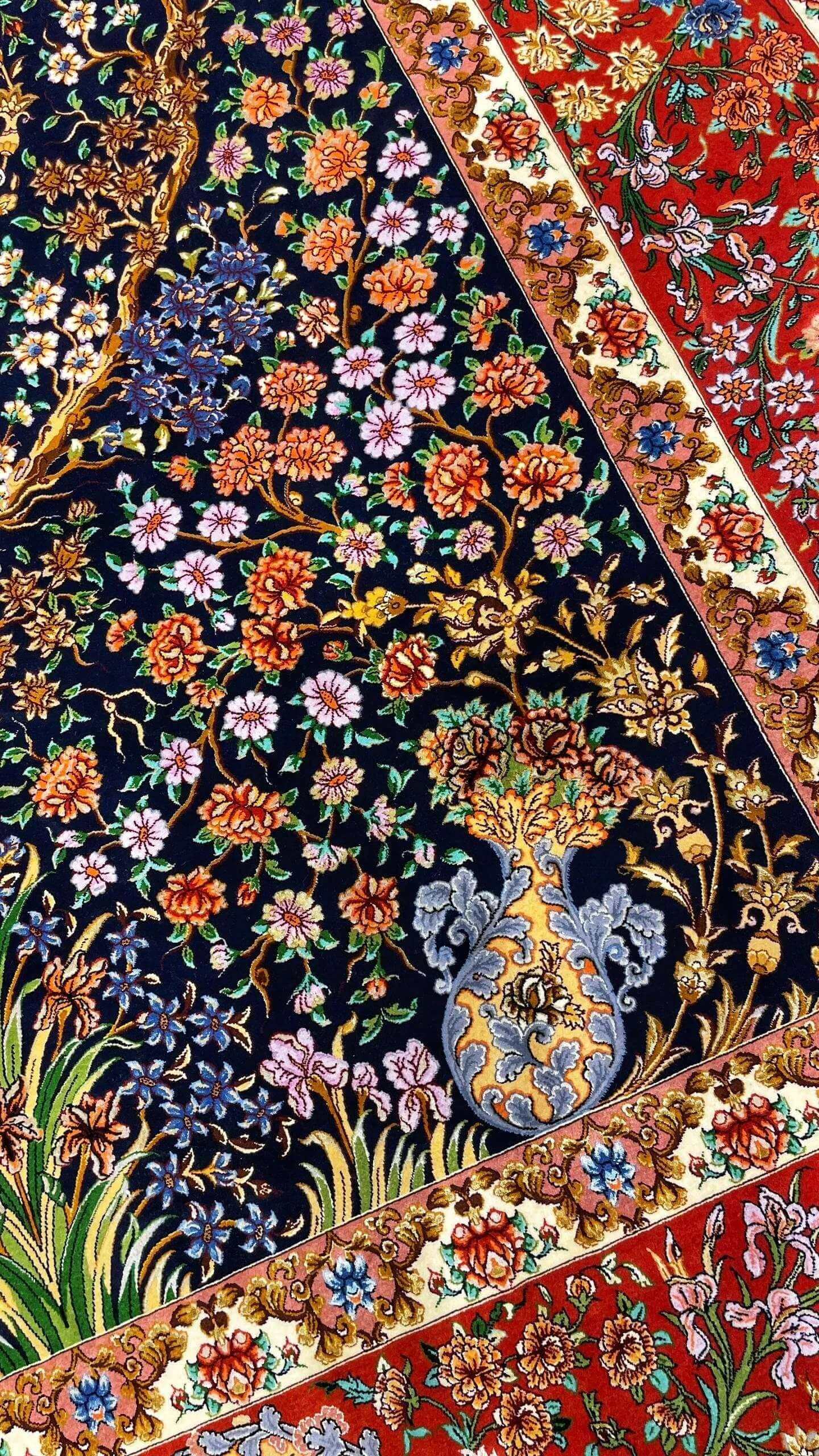 Expansive view of a Persian Isfahan rug with detailed Tree of Life floral designs