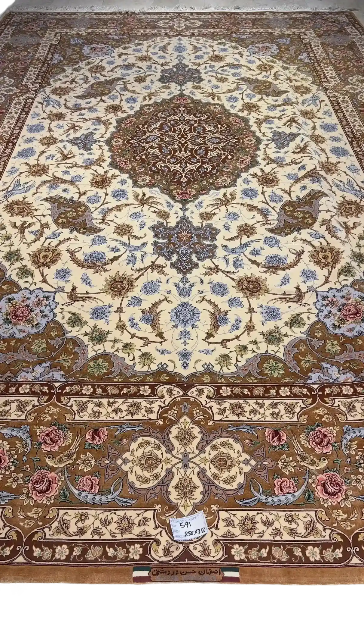 Hand-Knotted Isfahan Persian Rug by Master Weaver Hassan Dardashtie
A luxurious Persian rug from Isfahan, hand-knotted by Master Hassan Dardashtie. The 300x200 cm (9.8x6.5 feet) rug features an intricate medallion and border made of silk with a woolen base, showcasing exquisite craftsmanship.