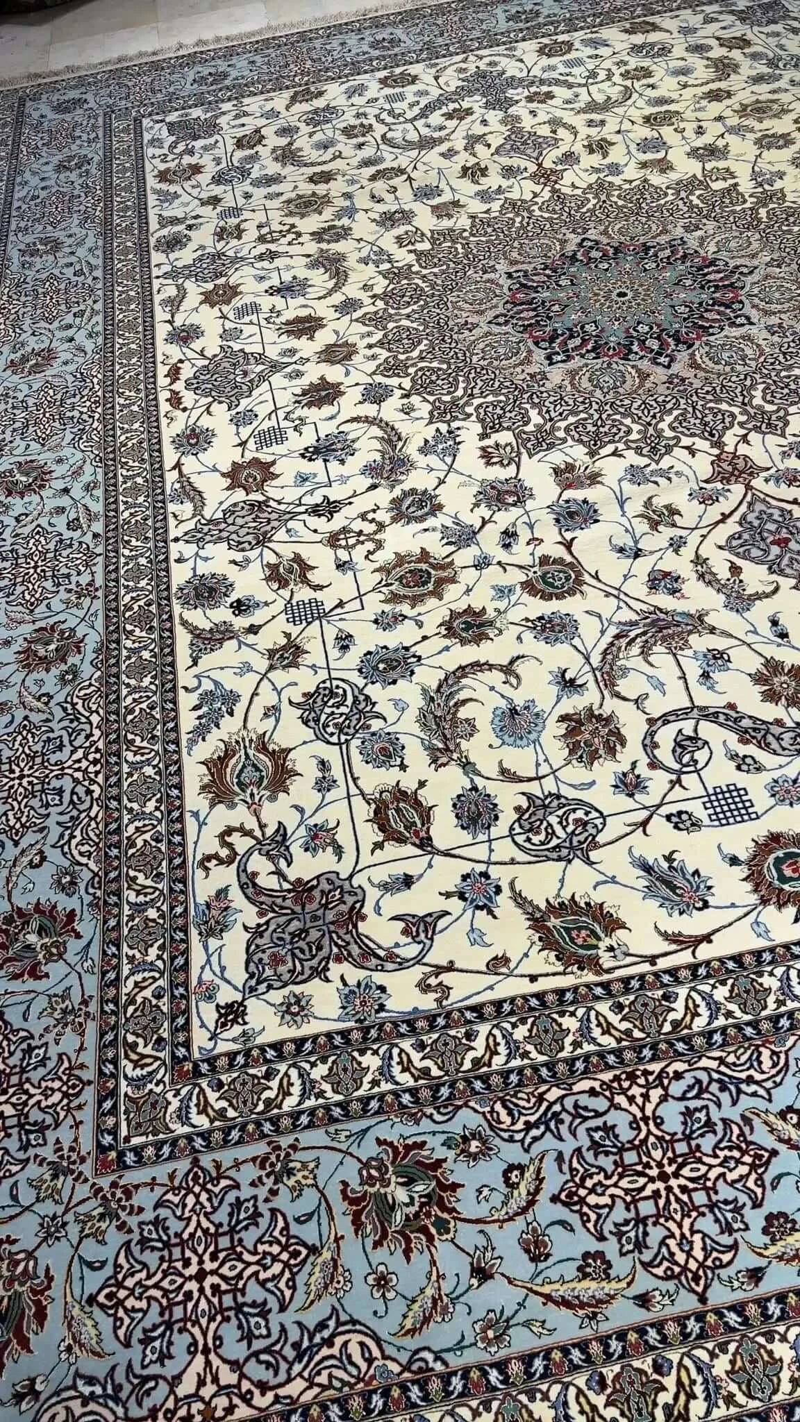 "Vintage Persian Rug, Handwoven in Isfahan, Iran – Masterpiece of Silk and Wool" – Highlighting the vintage nature and materials.
