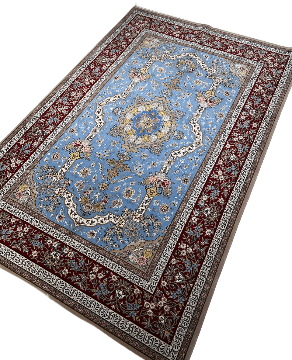 Mansourie rug with a classic Persian design in blue, gold, and red tones, showcasing hand-knotted craftsmanship with silk and wool materials.
