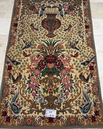 The 130x80 cm Esfahan Persian rug is a stunning piece of Persian rug-making that boasts an impressive level of craftsmanship, luxurious materials, and exceptional design