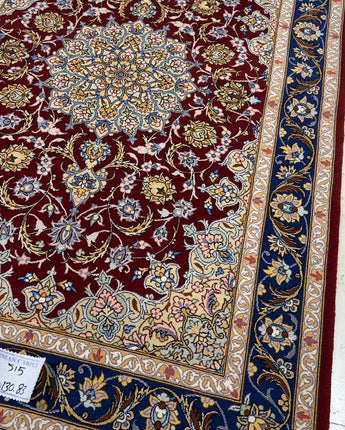 The 130x83 cm Esfahan Persian rug by Hamid Atrian workshop is a stunning piece of Persian rug-making that boasts an impressive level of craftsmanship, luxurious materials, and exceptional design.