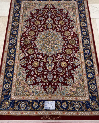 The 130x83 cm Esfahan Persian rug by Hamid Atrian workshop is a stunning piece of Persian rug-making that boasts an impressive level of craftsmanship, luxurious materials, and exceptional design.