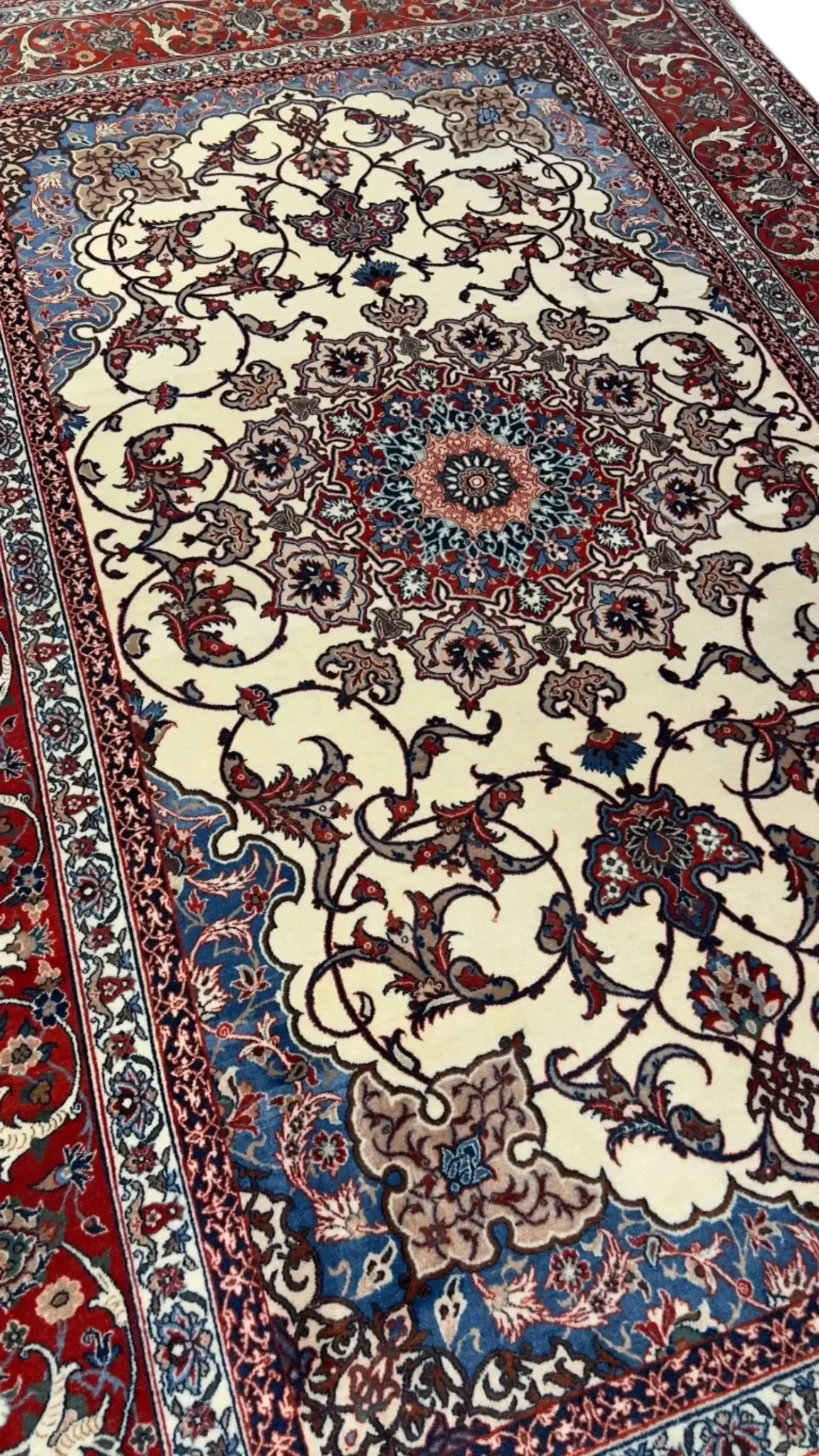 Close-up of the detailed medallion centerpiece on Master Bagher Seirafian Isfahan silk-wool rug