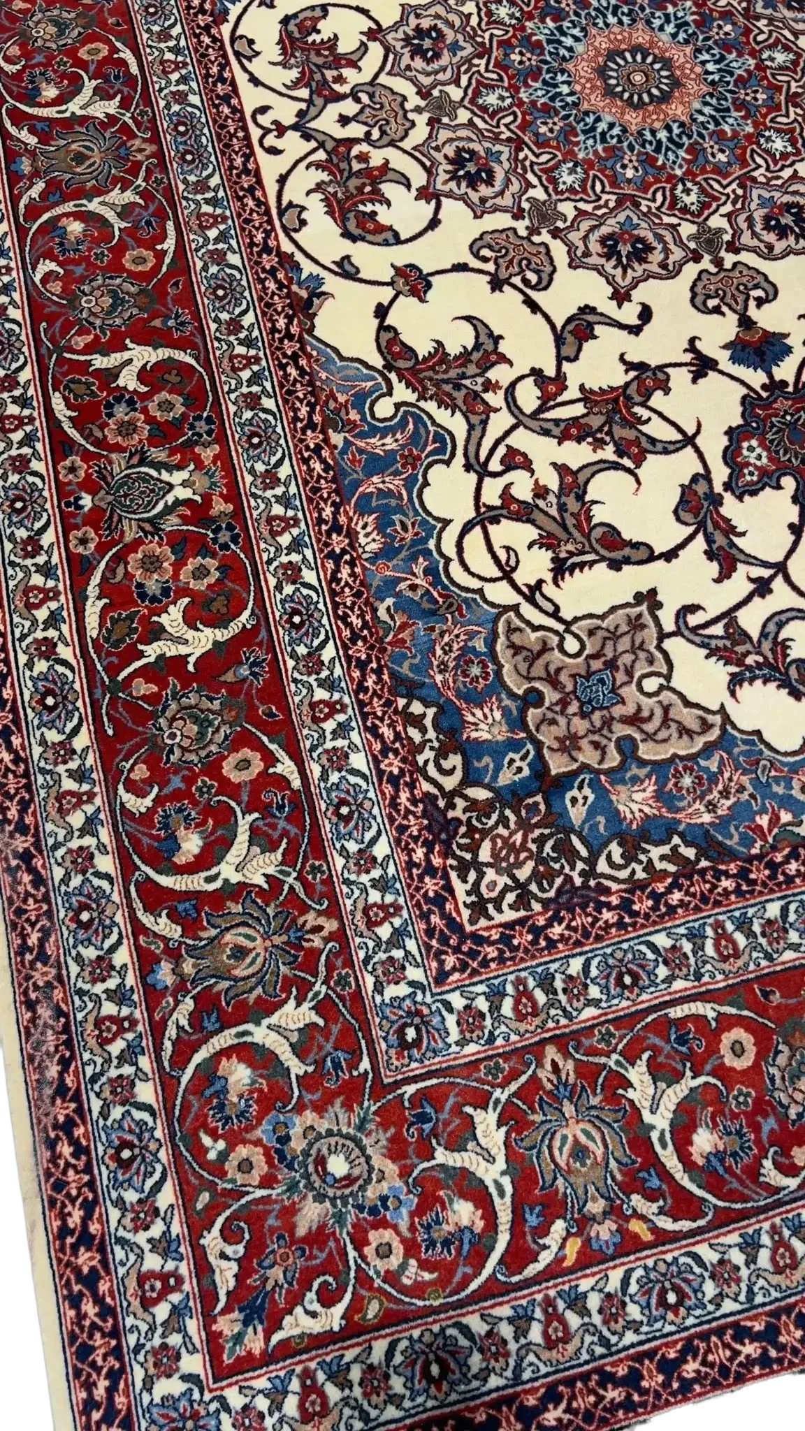 Isfahan Silk Wool Rug by Master Bagher Seirafian with red, blue, and white intricate patterns