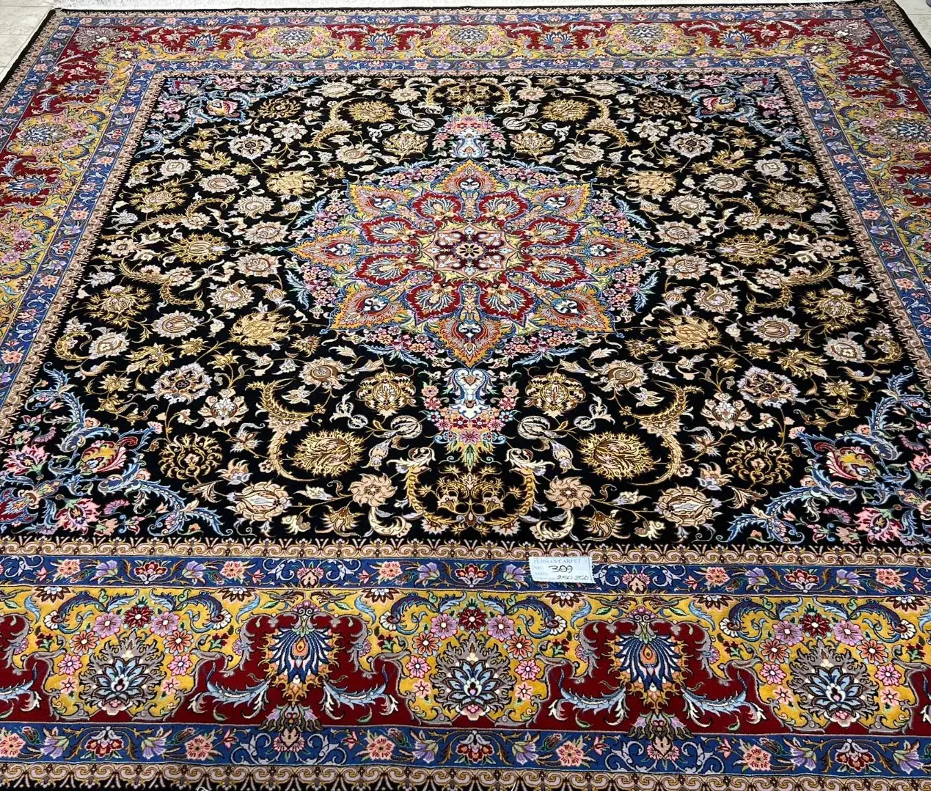 "Exquisite Persian Isfahan rug, crafted with wool and silk. This hand-knotted 259 cm x 250 cm rug offers a knot density of 810,000 knots/m², ideal for enhancing home décor."

