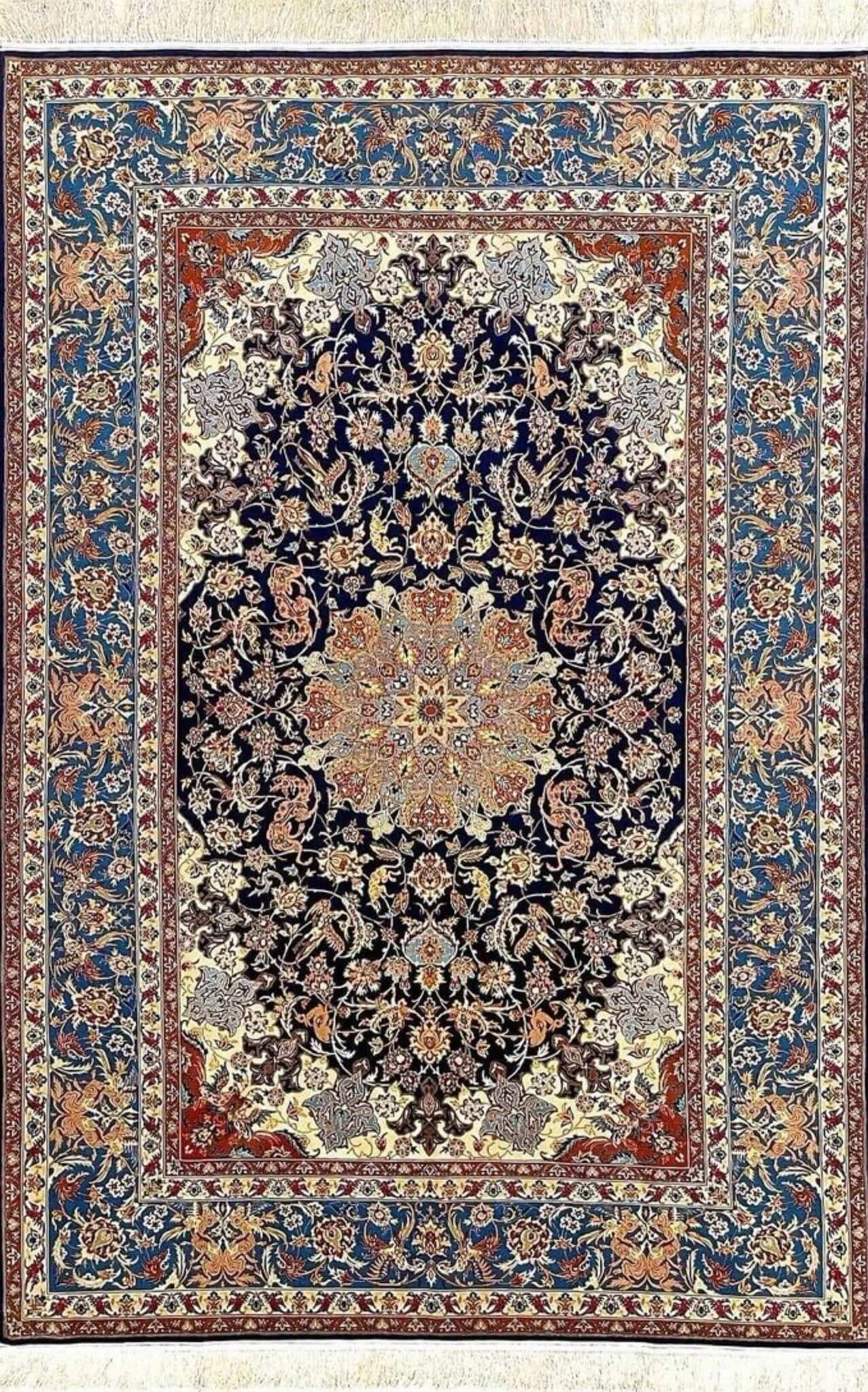 Vintage Persian rug handmade in Isfahan, featuring a traditional medallion design.
