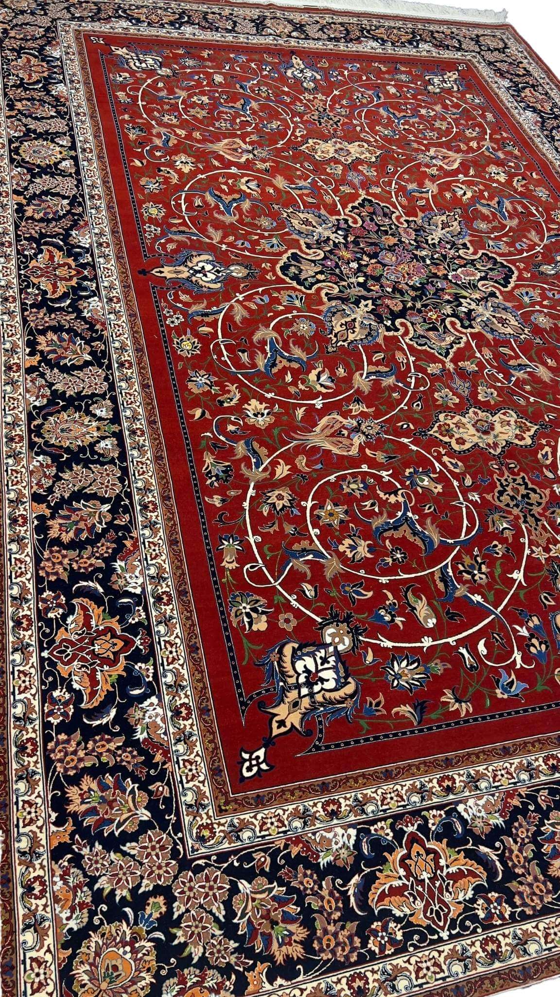 "Detailed Persian carpet with floral motifs and navy border by Bagher Seirafian."
